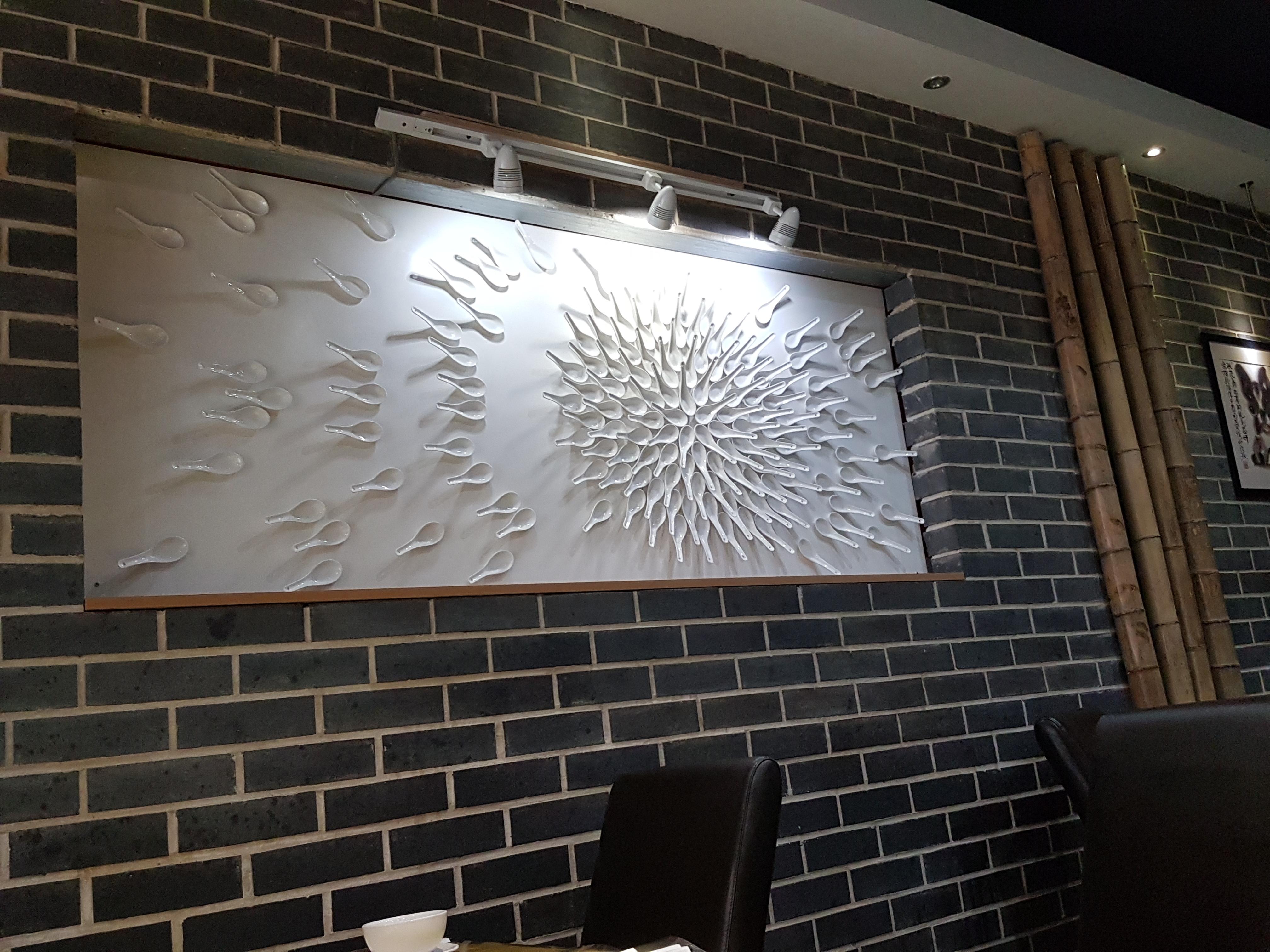 This wall art in a Chinese restaurant r/ATBGE