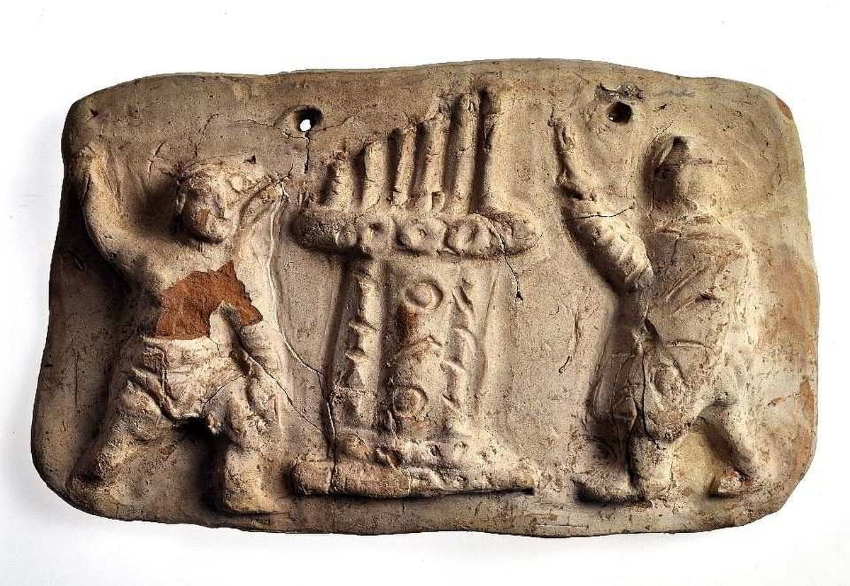 Roman relief showing the water organs (hydraulis) and on the sides of