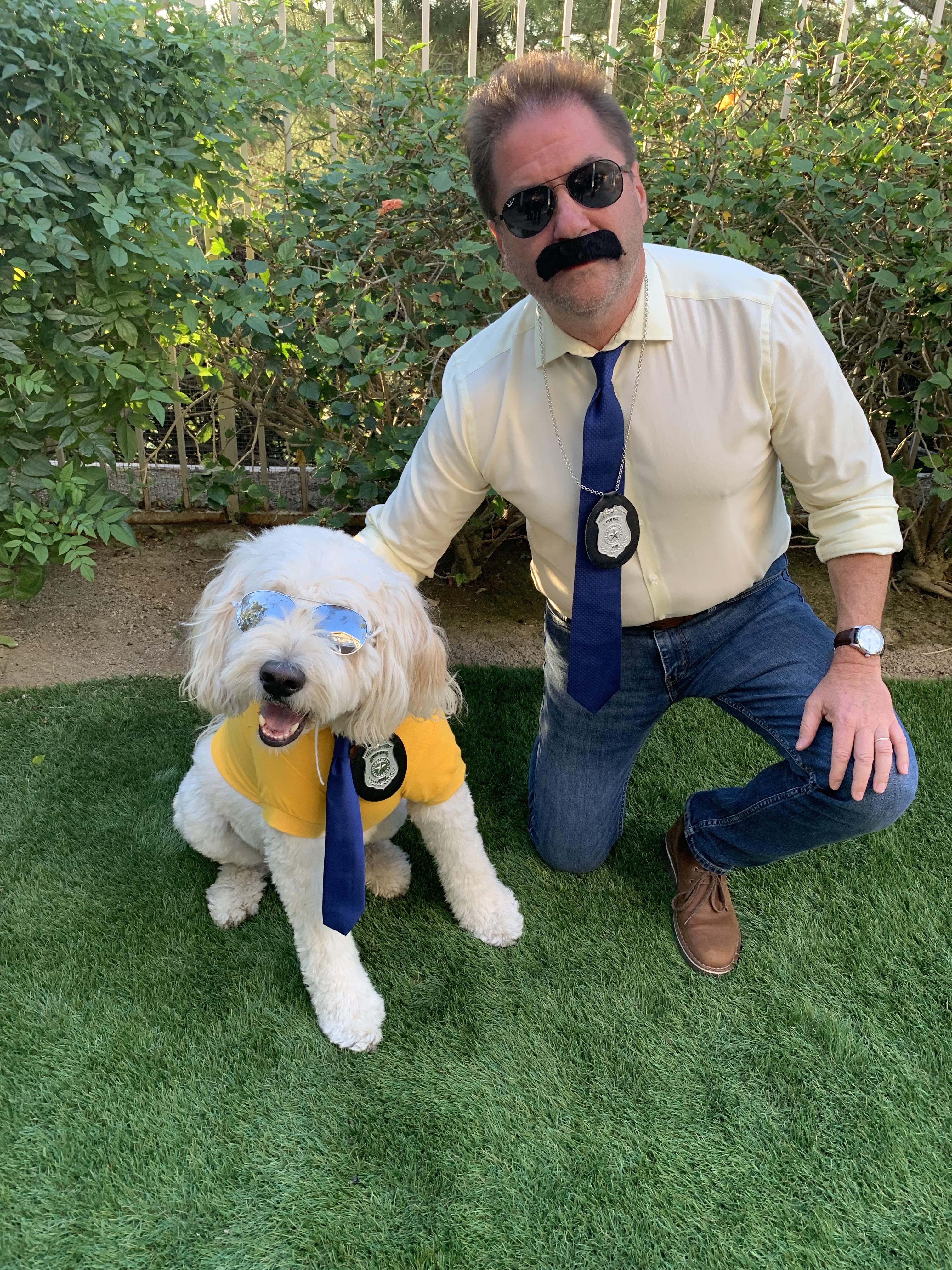 My dad and our dog dress up as LiMu Emu and Doug from the insurance