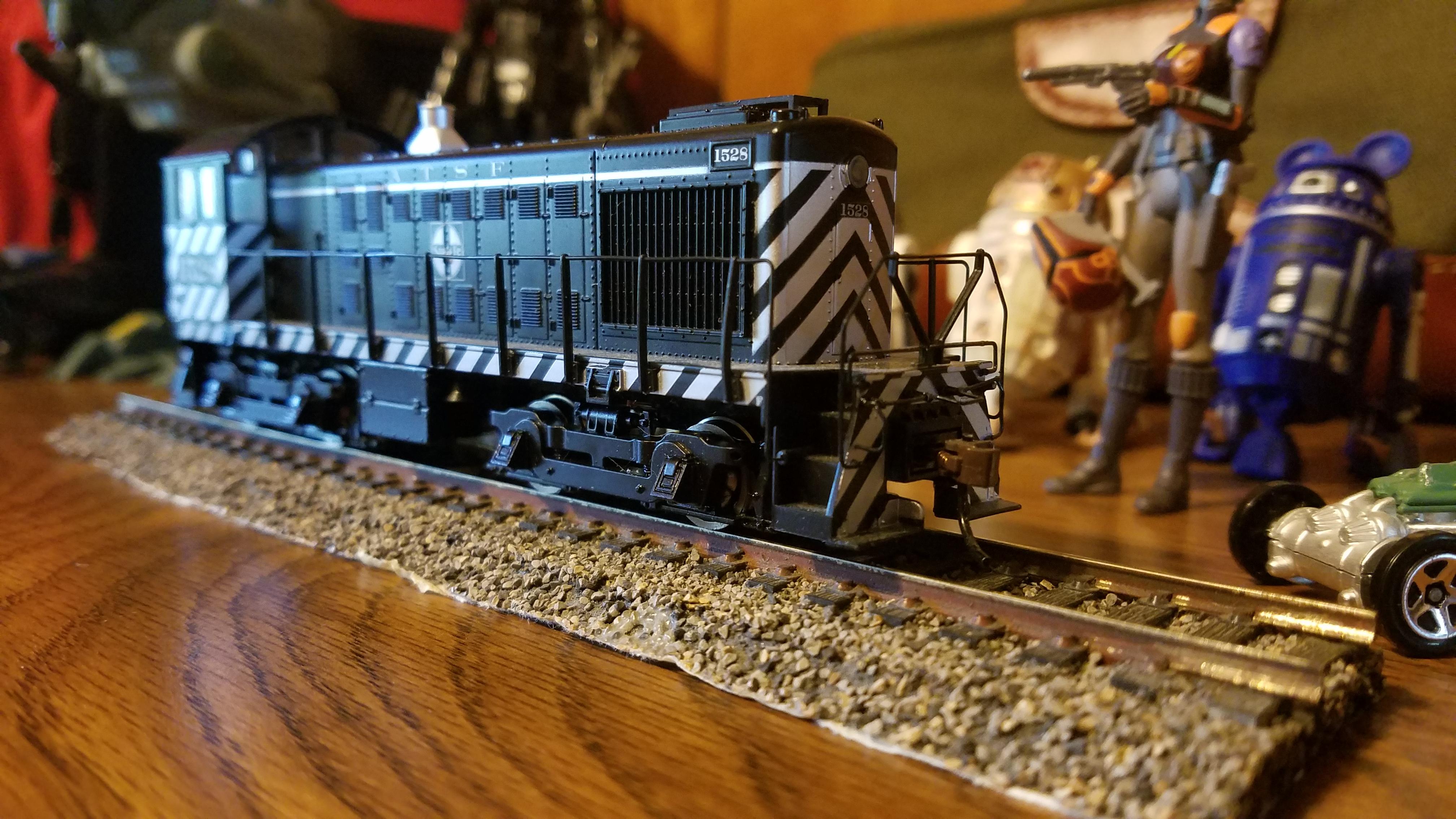 Just finished a little segment of track ballast made with real ballast