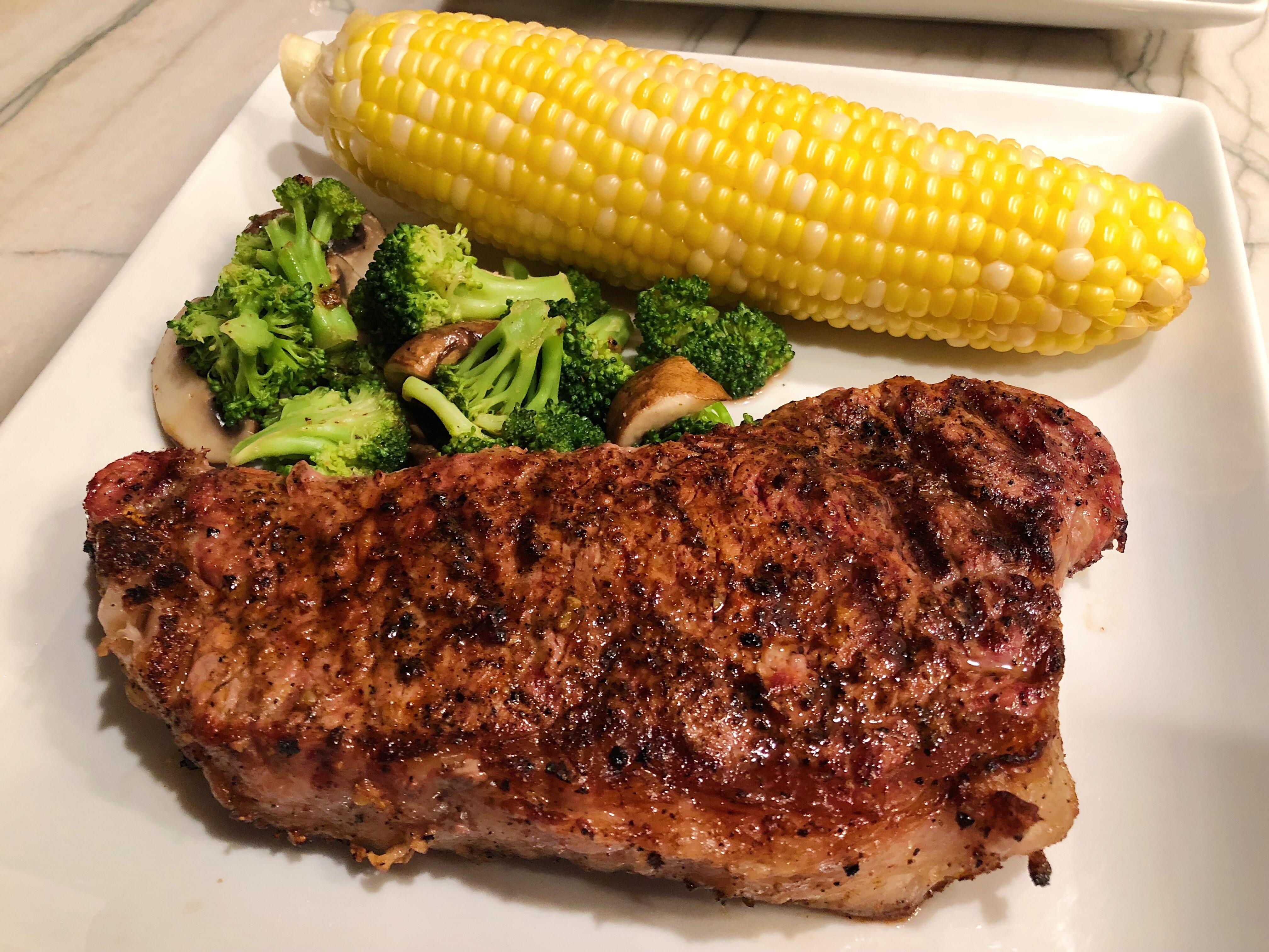 [Homemade] Charcoal grilled NY Strip r/food