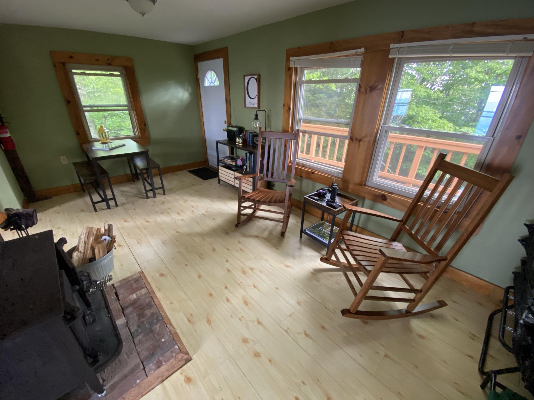 Simple and clean one room mountain cabin setup. WV, USA. The wall color