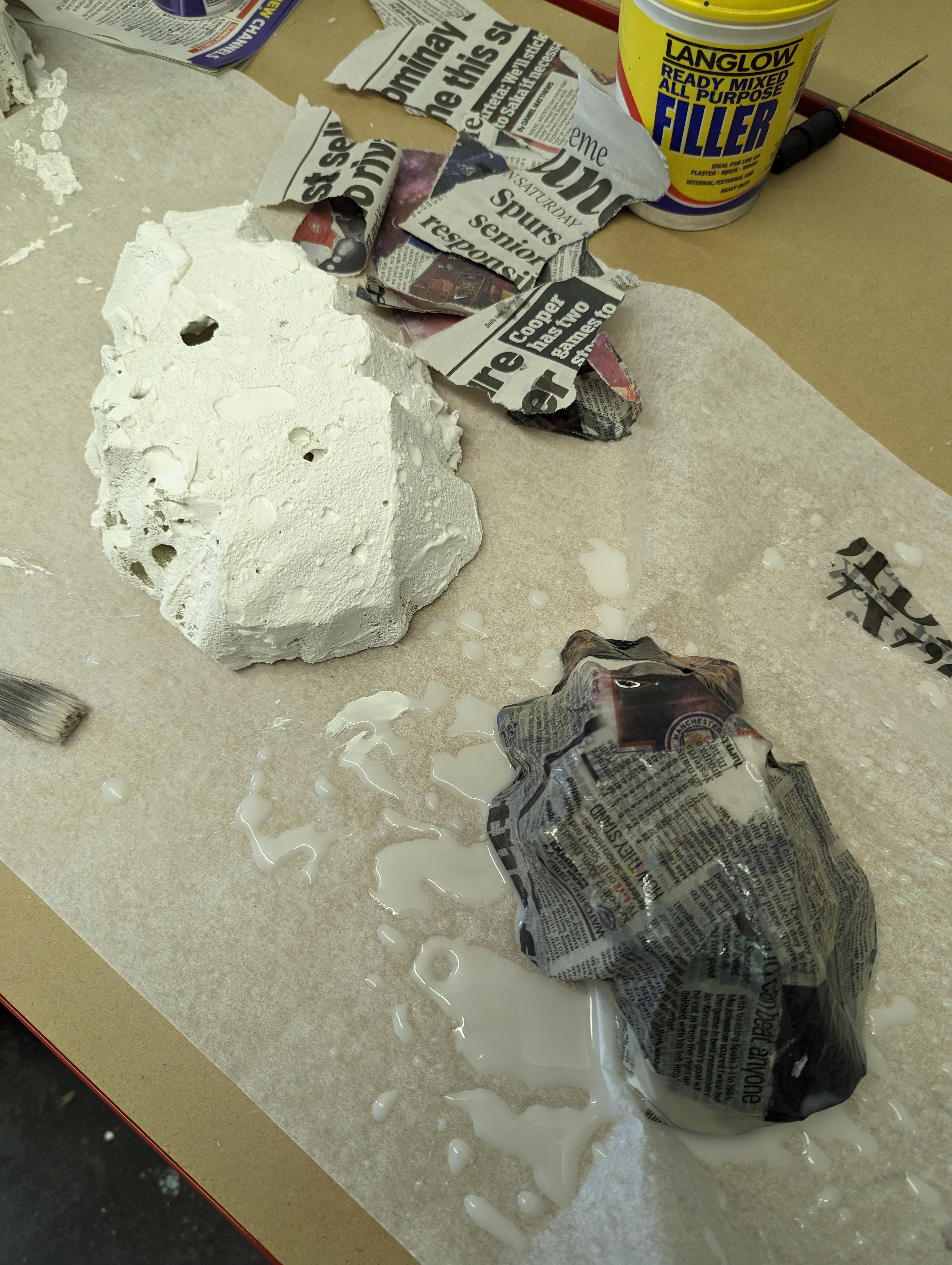 The missus wanted to see if filler or paper mache would be better for the expanding foam rocks
