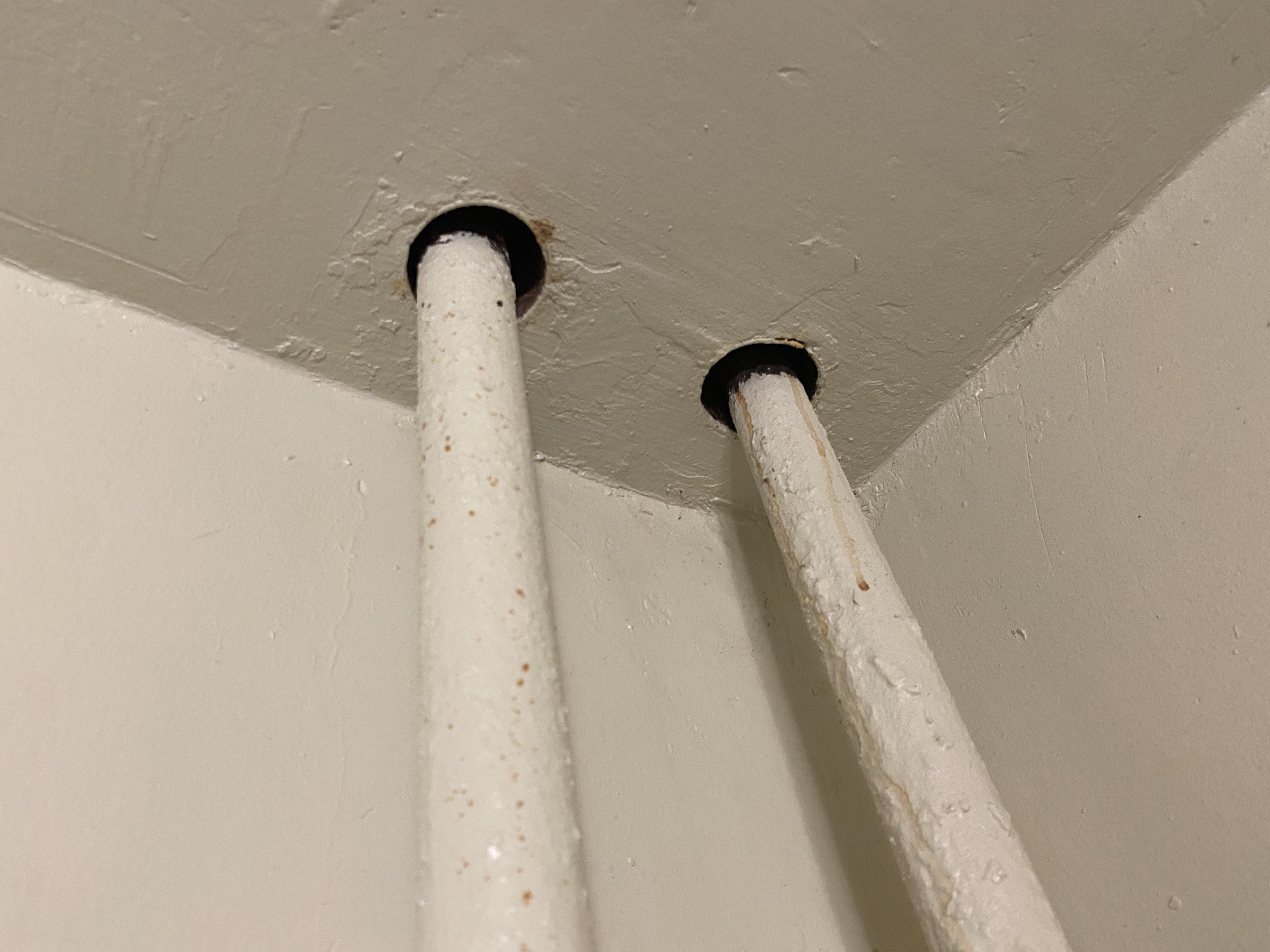 What to fill ceiling gap of radiator pipes? r/Plumbing