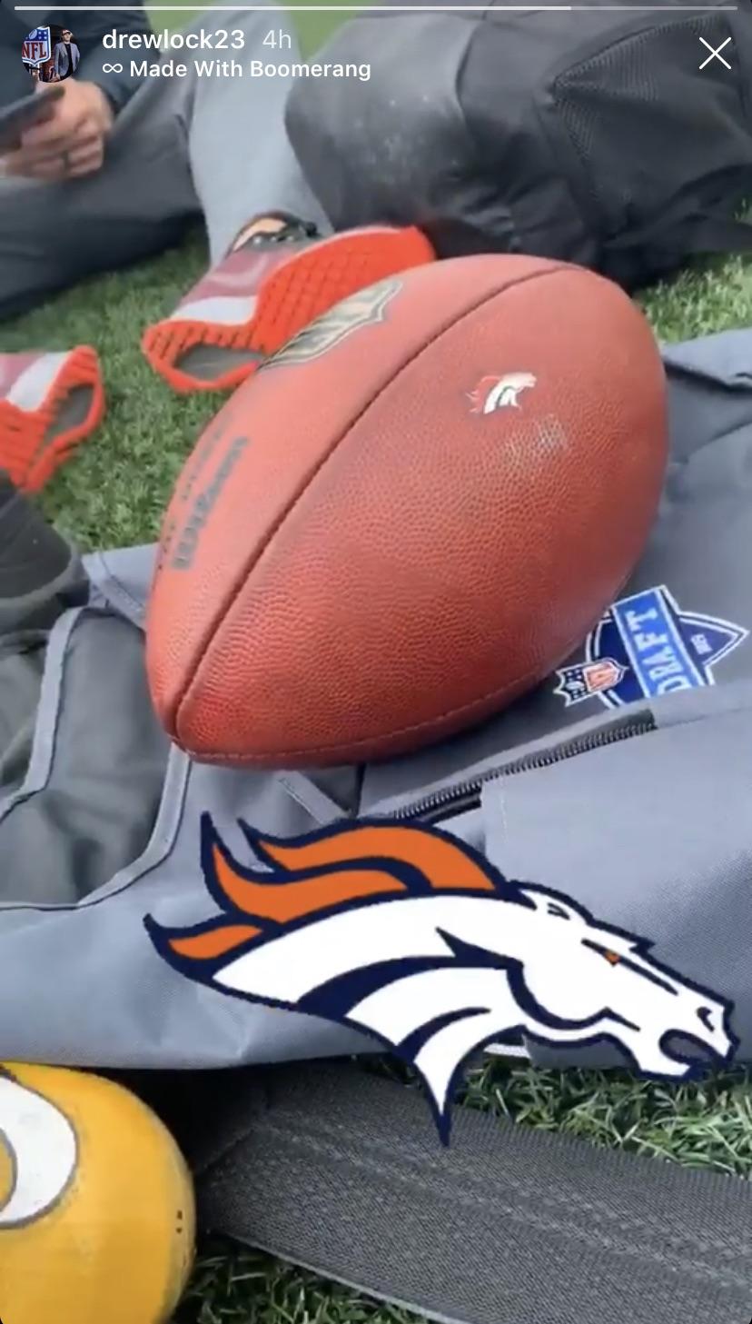 Drew getting ready to throw that Broncos football over the Rocky