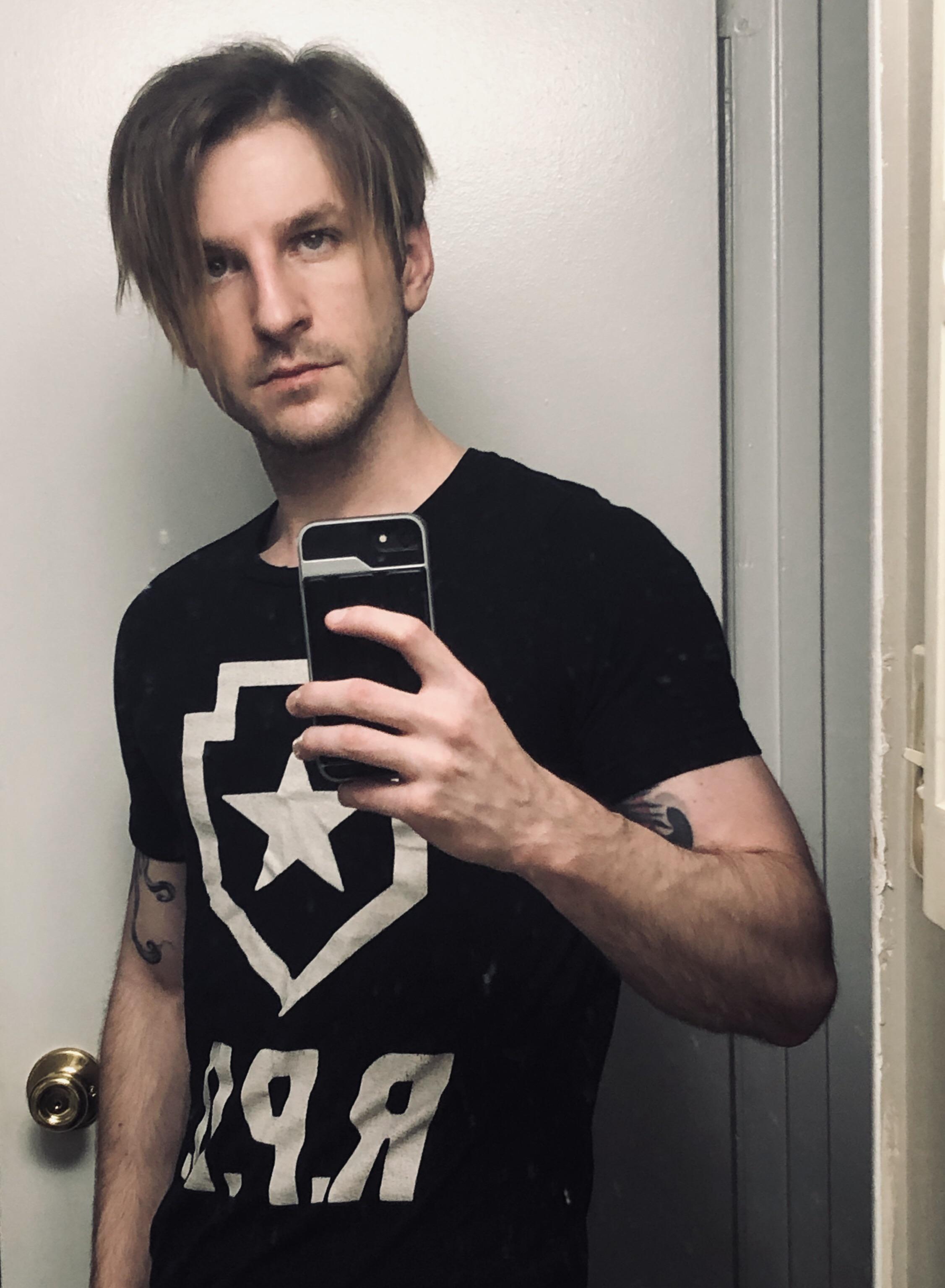 Long time lurker looking the part in my new RE2 remake shirt... r