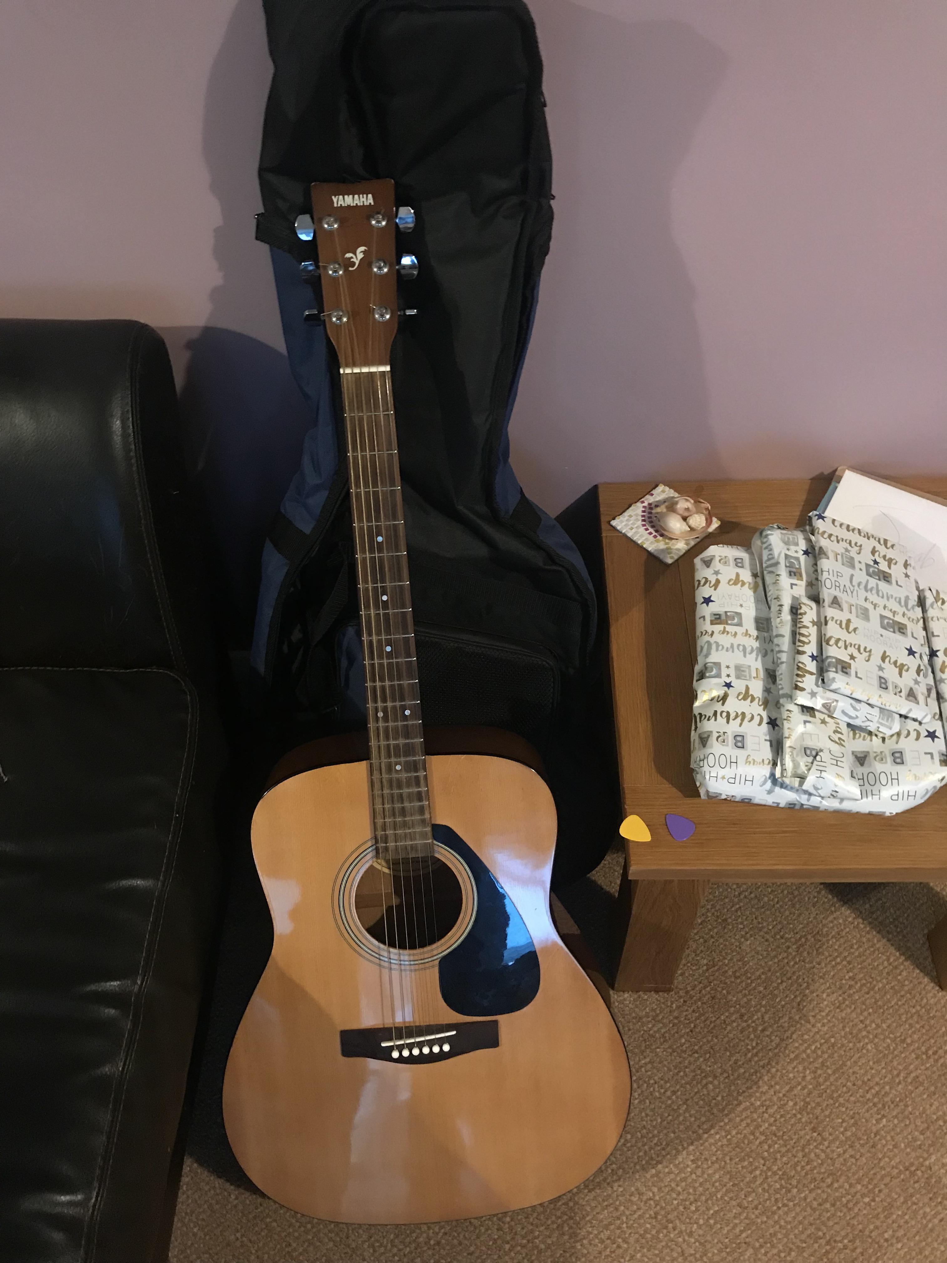 Just got a really nice second hand acoustic guitar, anyone have any