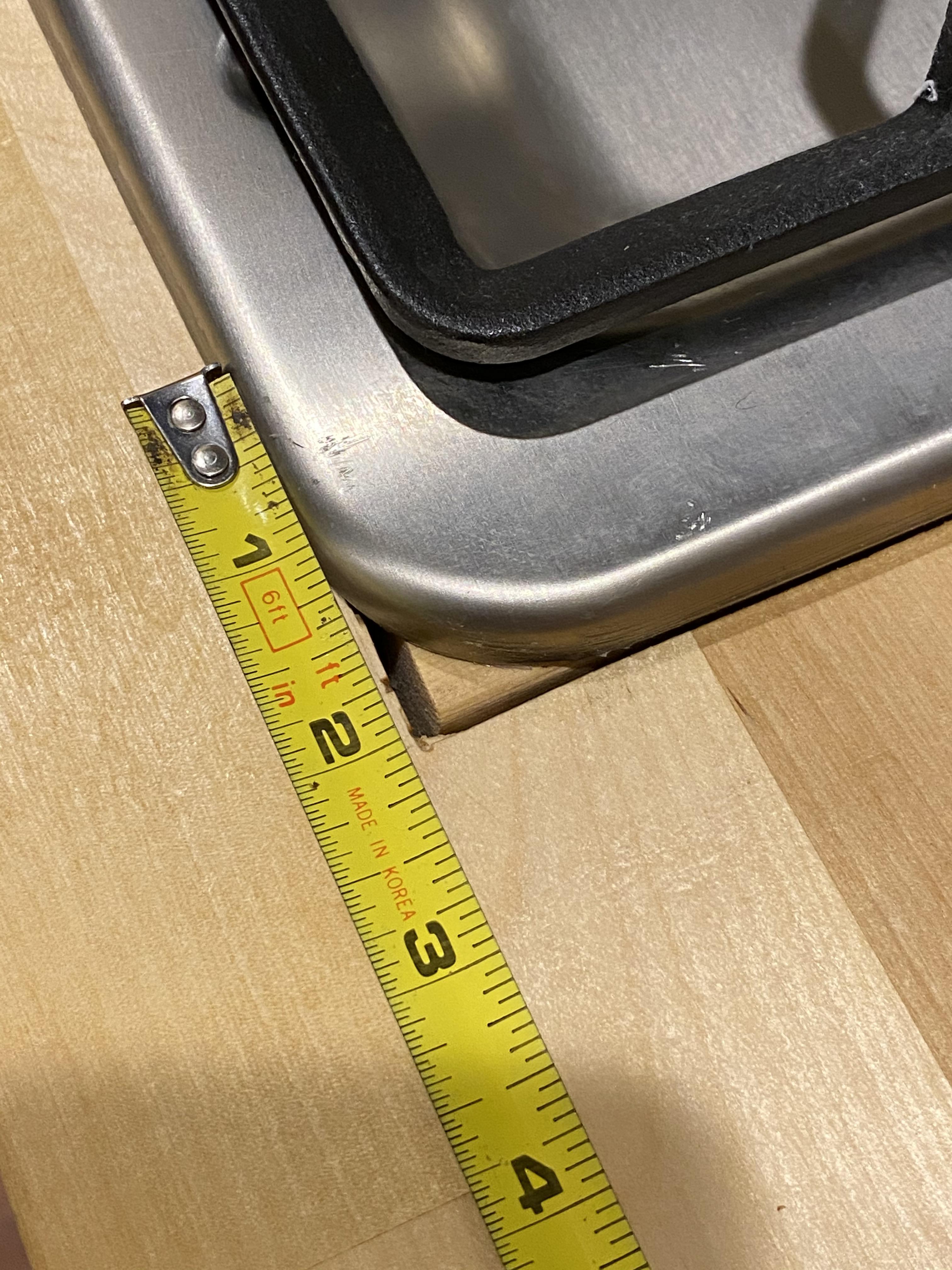 How can I best conceal this overcut corner? This is a butcher block