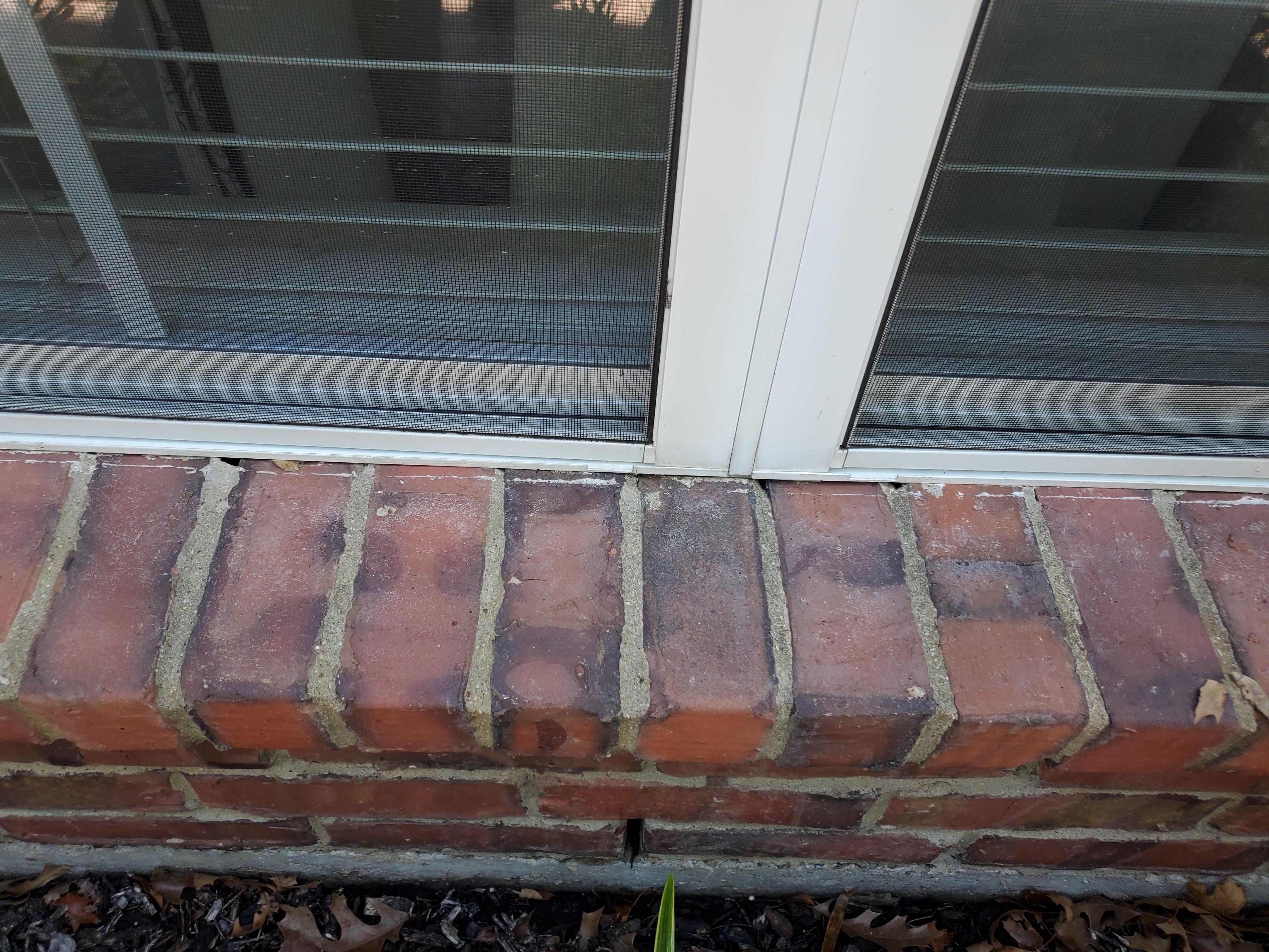 Possible to cover brick sills to prevent water entry? Detail in