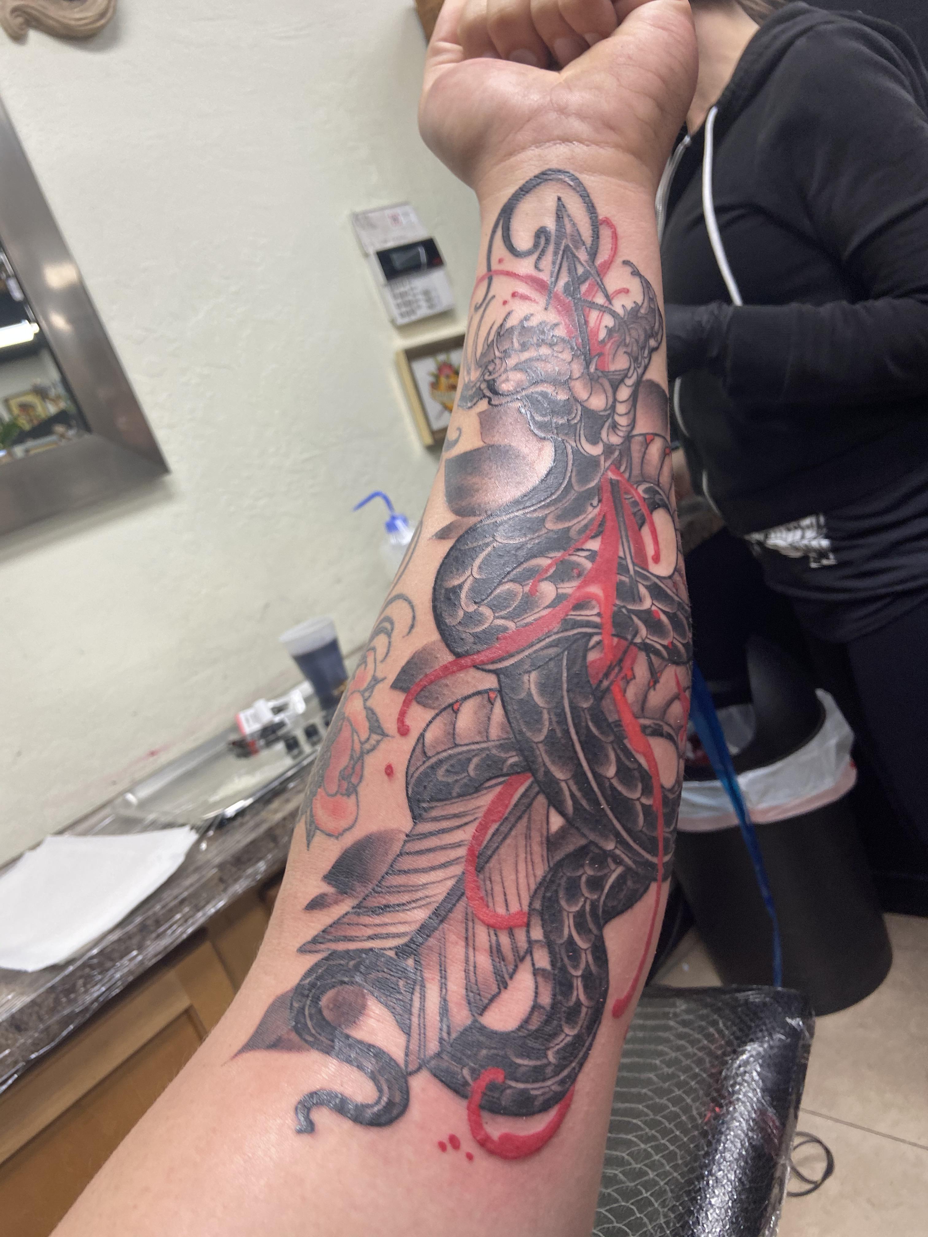 Super rad snake done today by Lindsay Dorman at Lady Luck