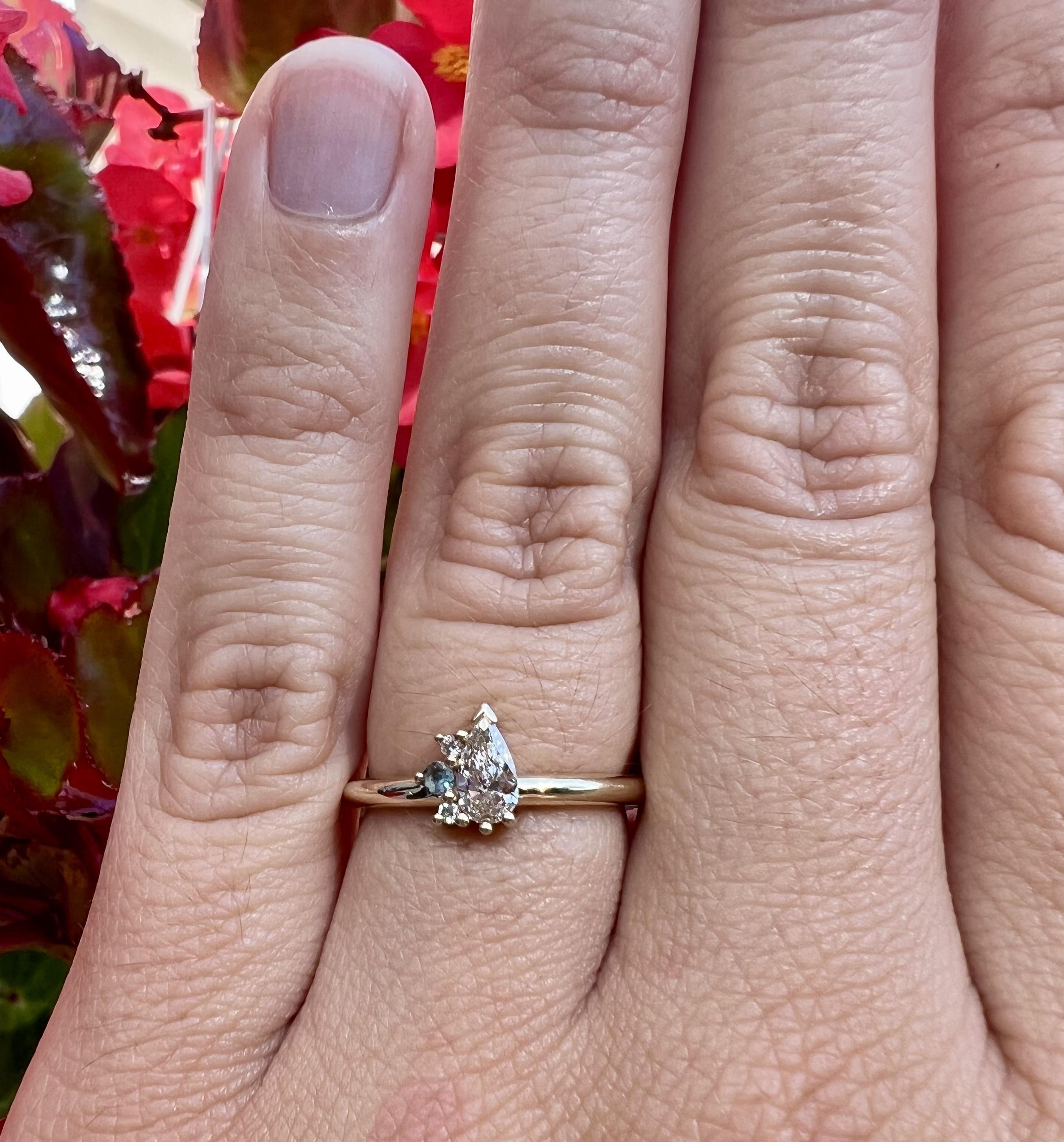 My friend is an amazing jeweler and custom made my ring with the help of my fiancée! 14K gold