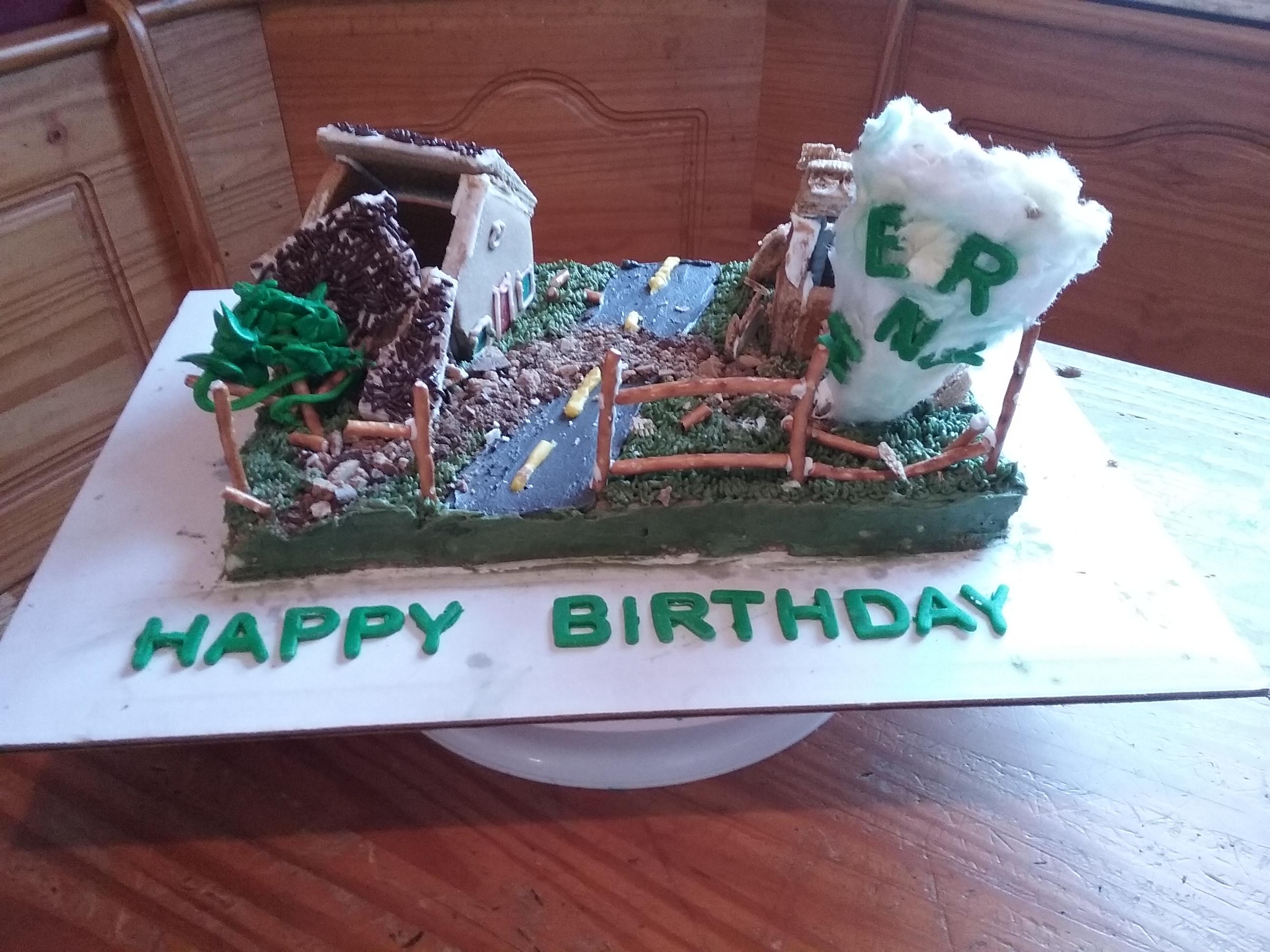A tornado cake I made for my son. Tornado is cotton candy covered