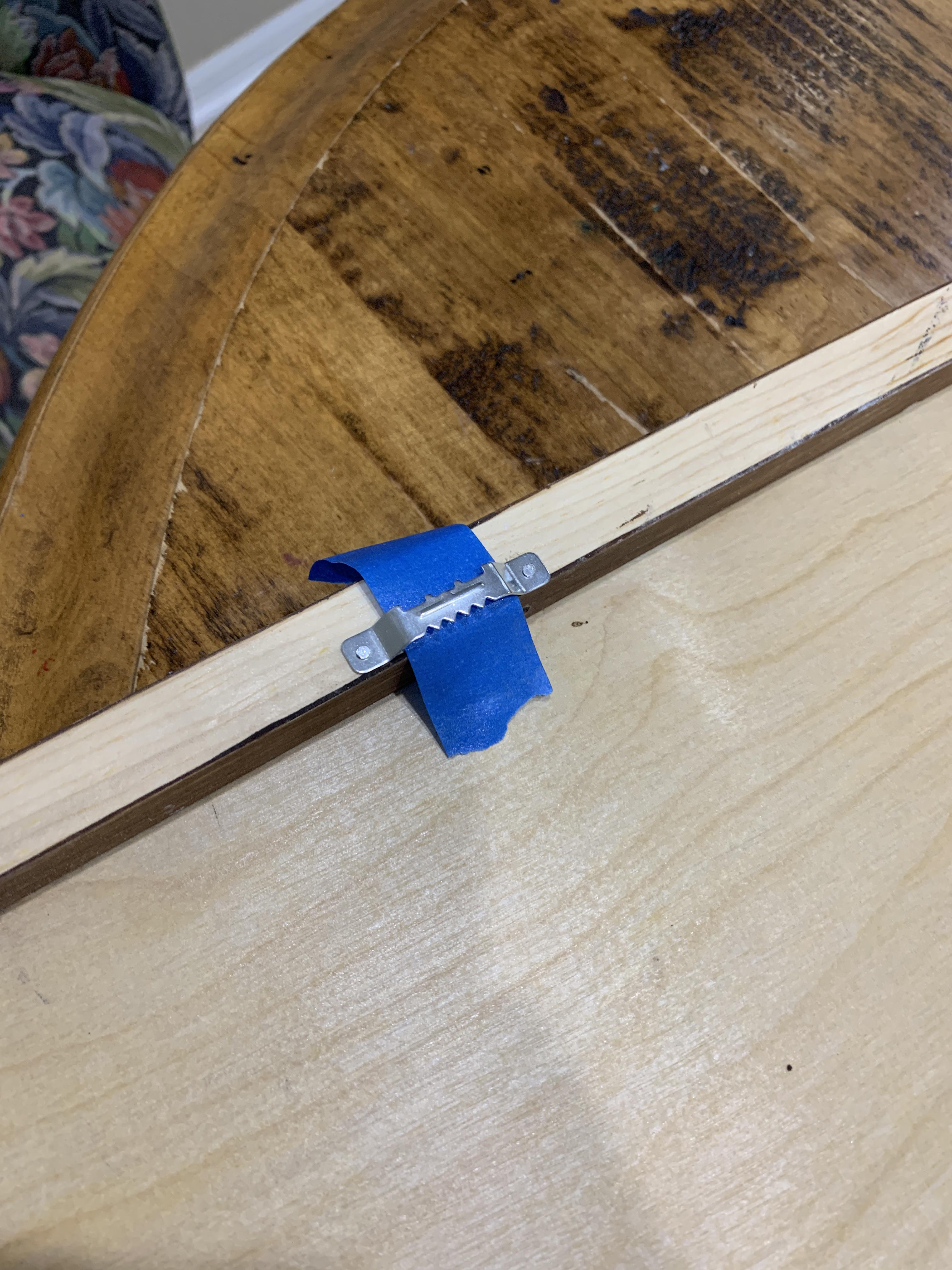 When hanging pictures, use painters tape to mark the width of the