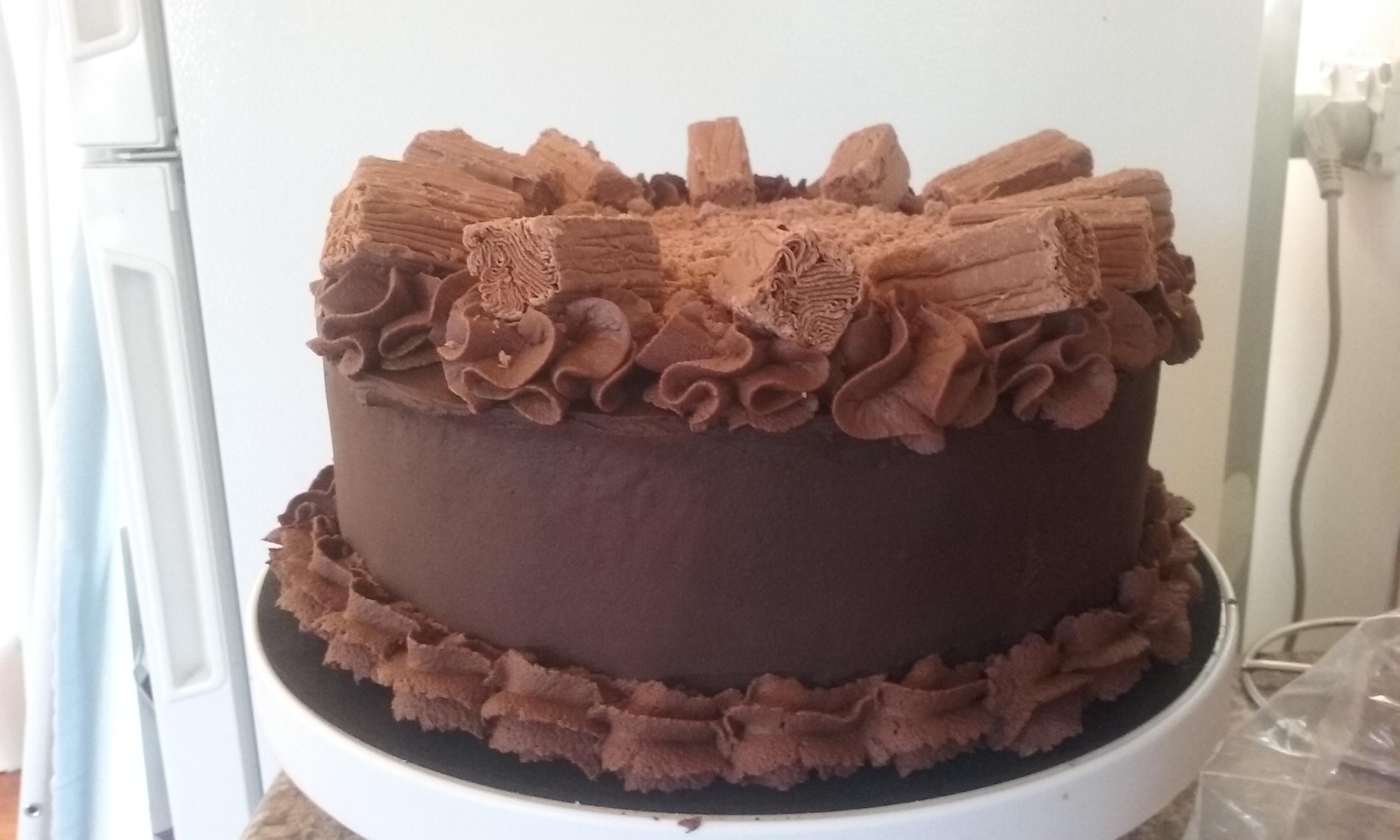 Chocolate ganache/Chocolate Flake cake I made for my boyfriends boss