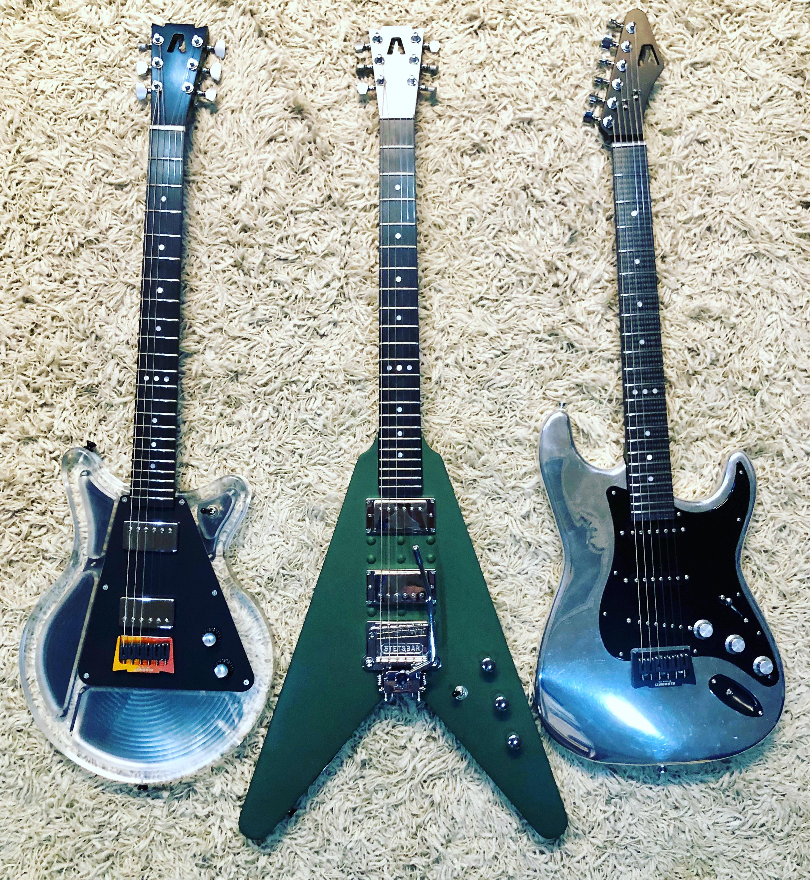 Aluminum guitar trio featuring Aluminati guitar necks! No wood on any of these guitars and