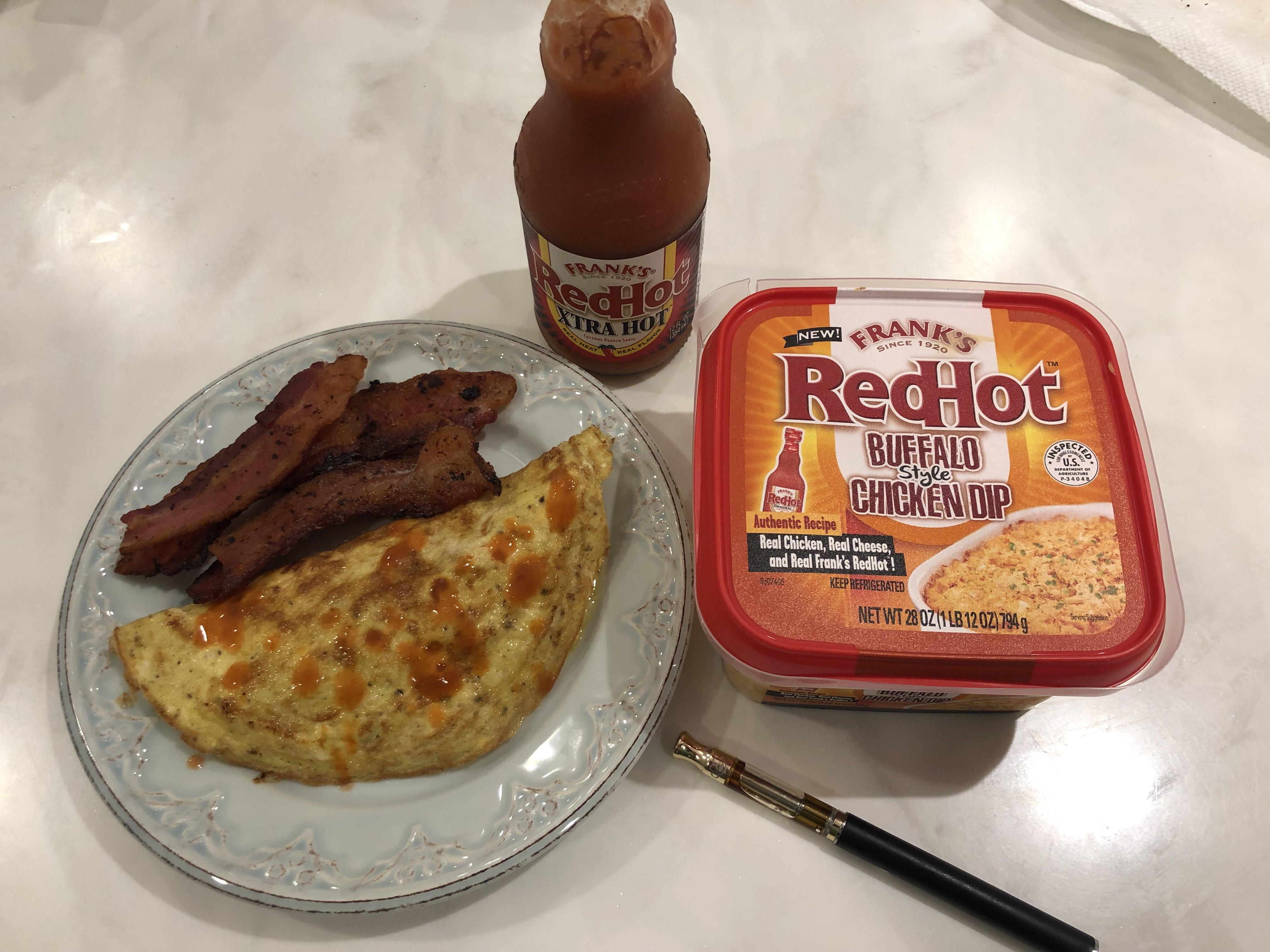 Omelette loaded with bacon and buffalo chicken dip. r/ketotrees