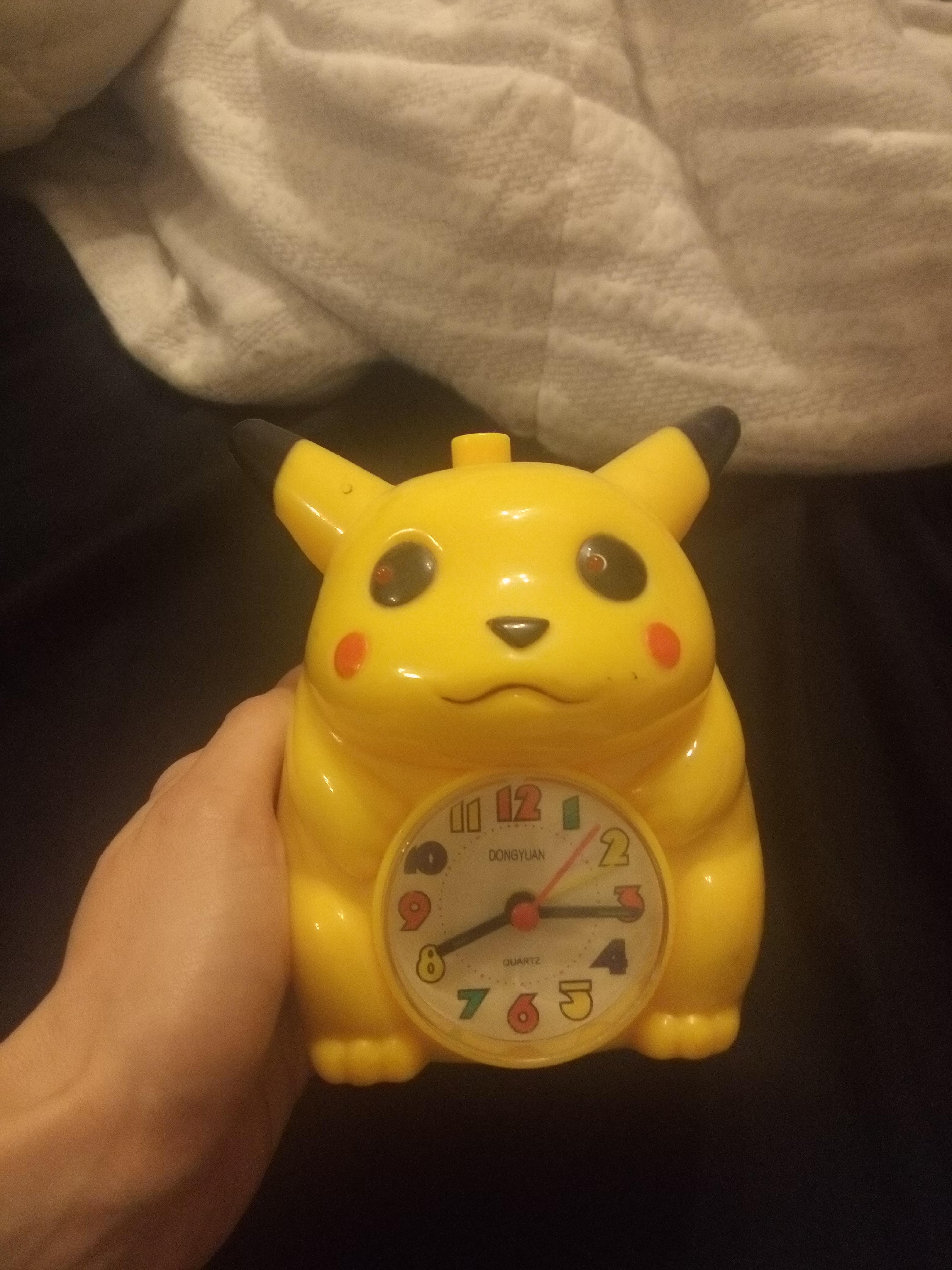 Anyone else have this creepy Pikachu alarm clock growing up? r/pokemon