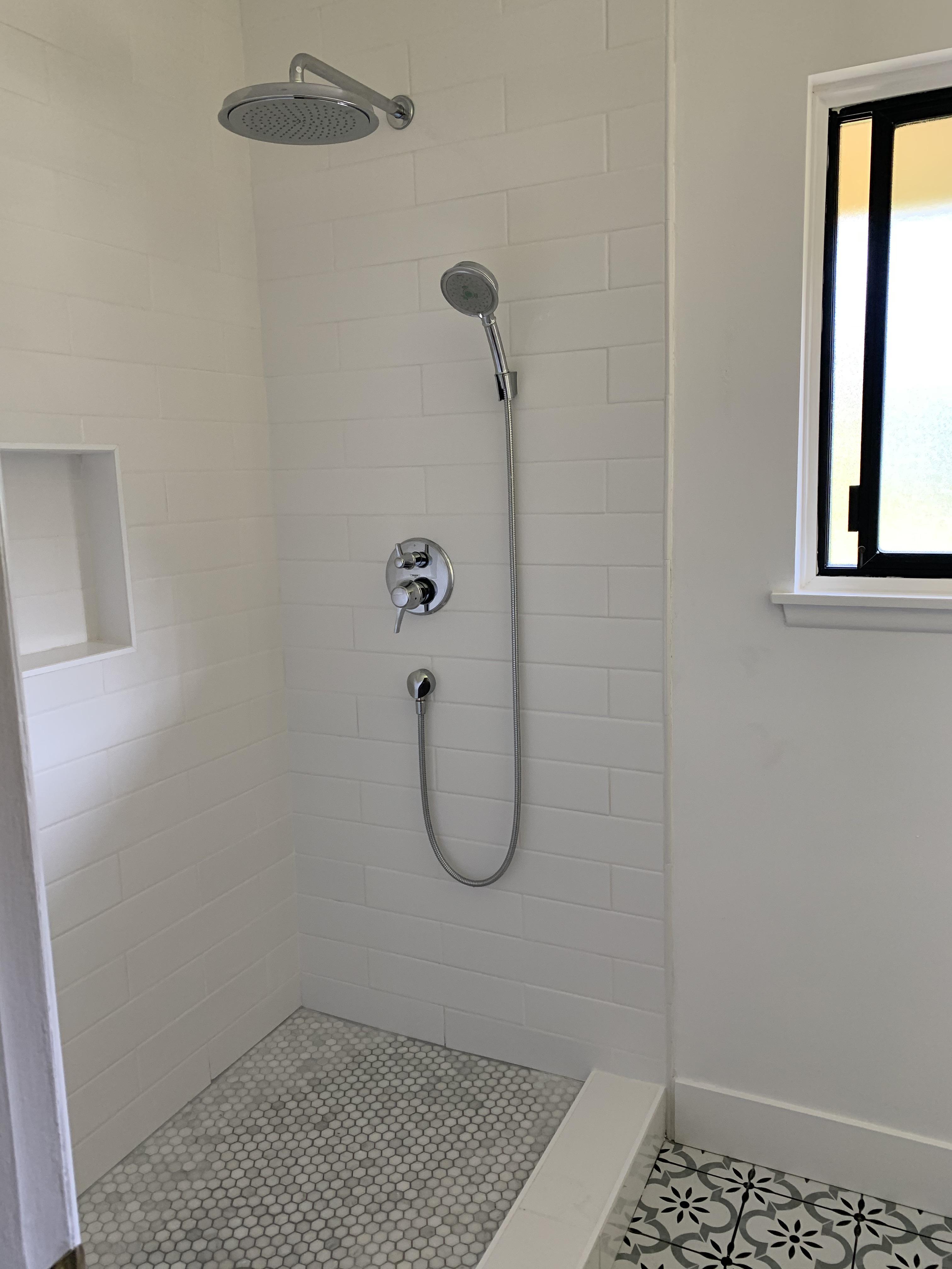 Is it crazy to get black hardware for shower door? We waffled have