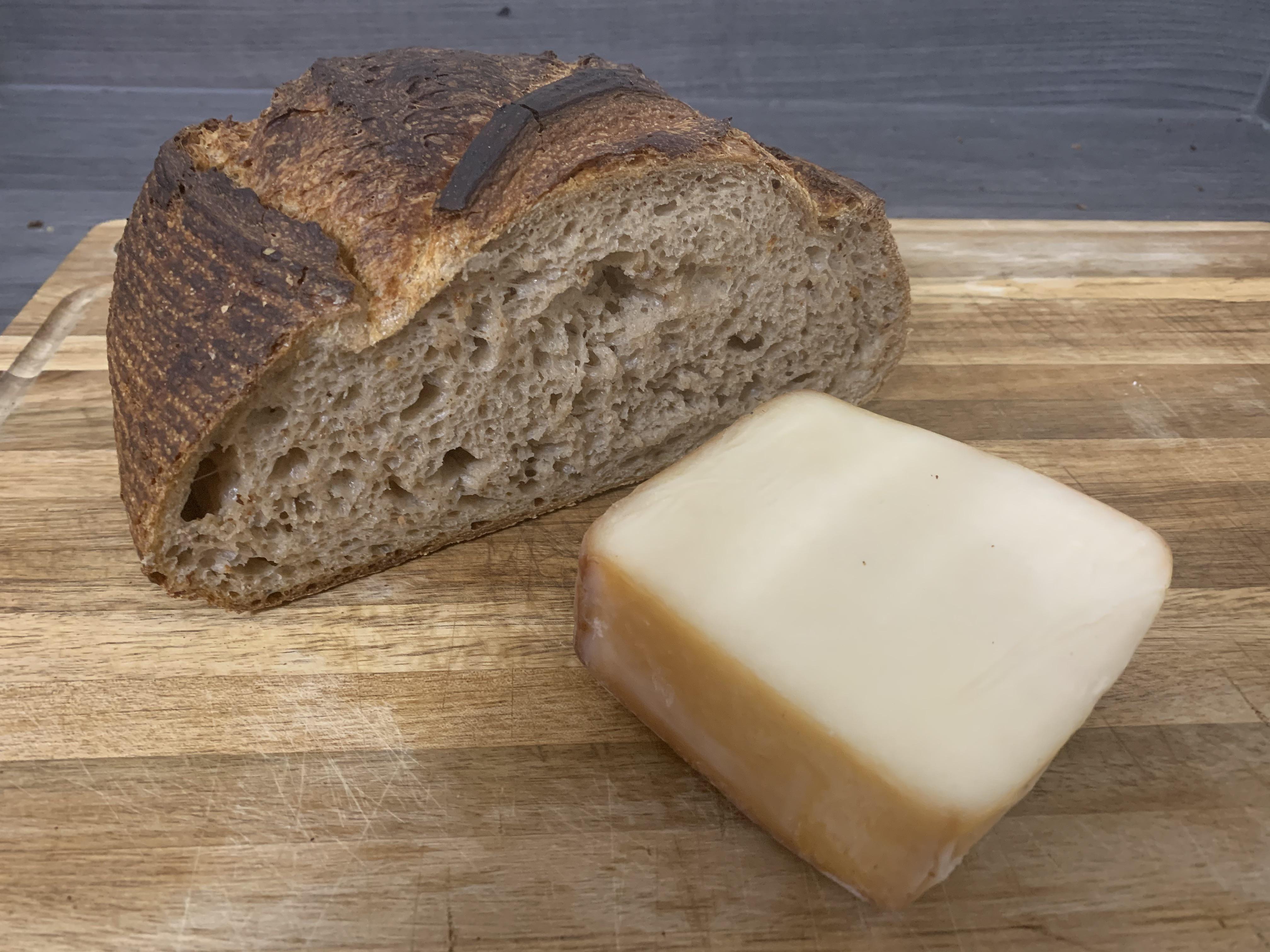 Nordic Creamery Smoked Goat Cheddar with a hunk of whole wheat