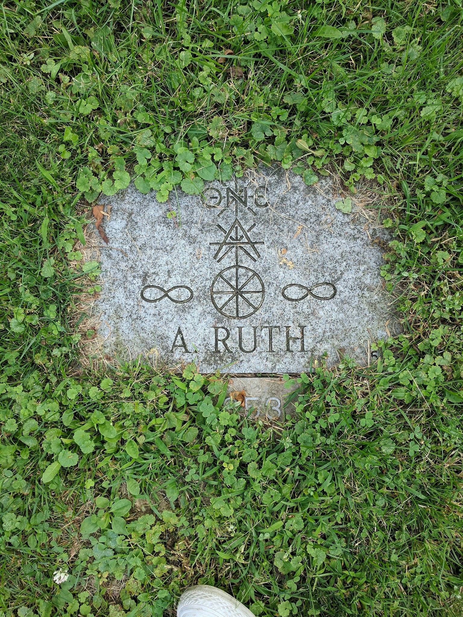 I found this mysterious gravestone while wandering around a cemetery