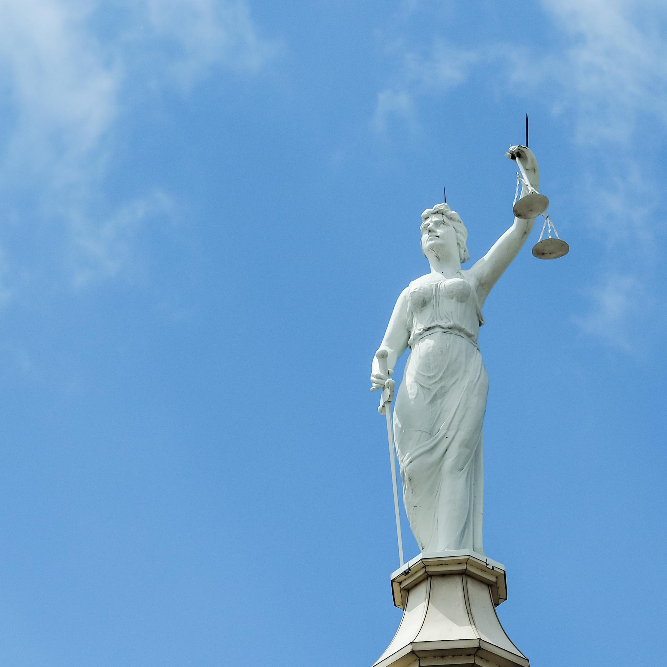 Justice statue atop the Bell County Courthouse, Belton, TX r/TexasViews
