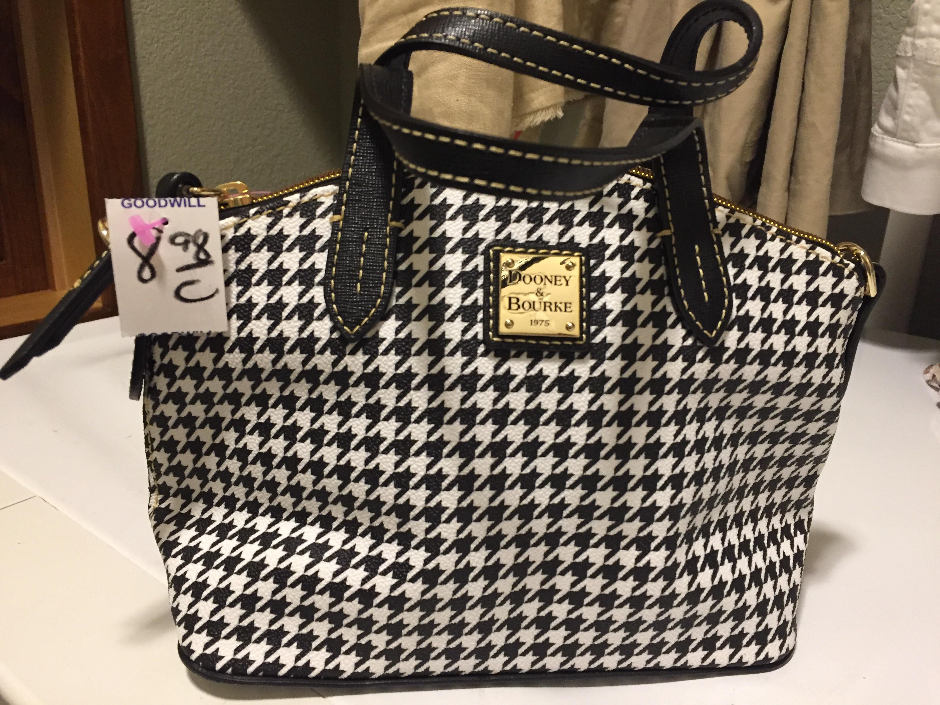 Dooney & Bourke bag retailed for 158 (tag still inside), but I got it