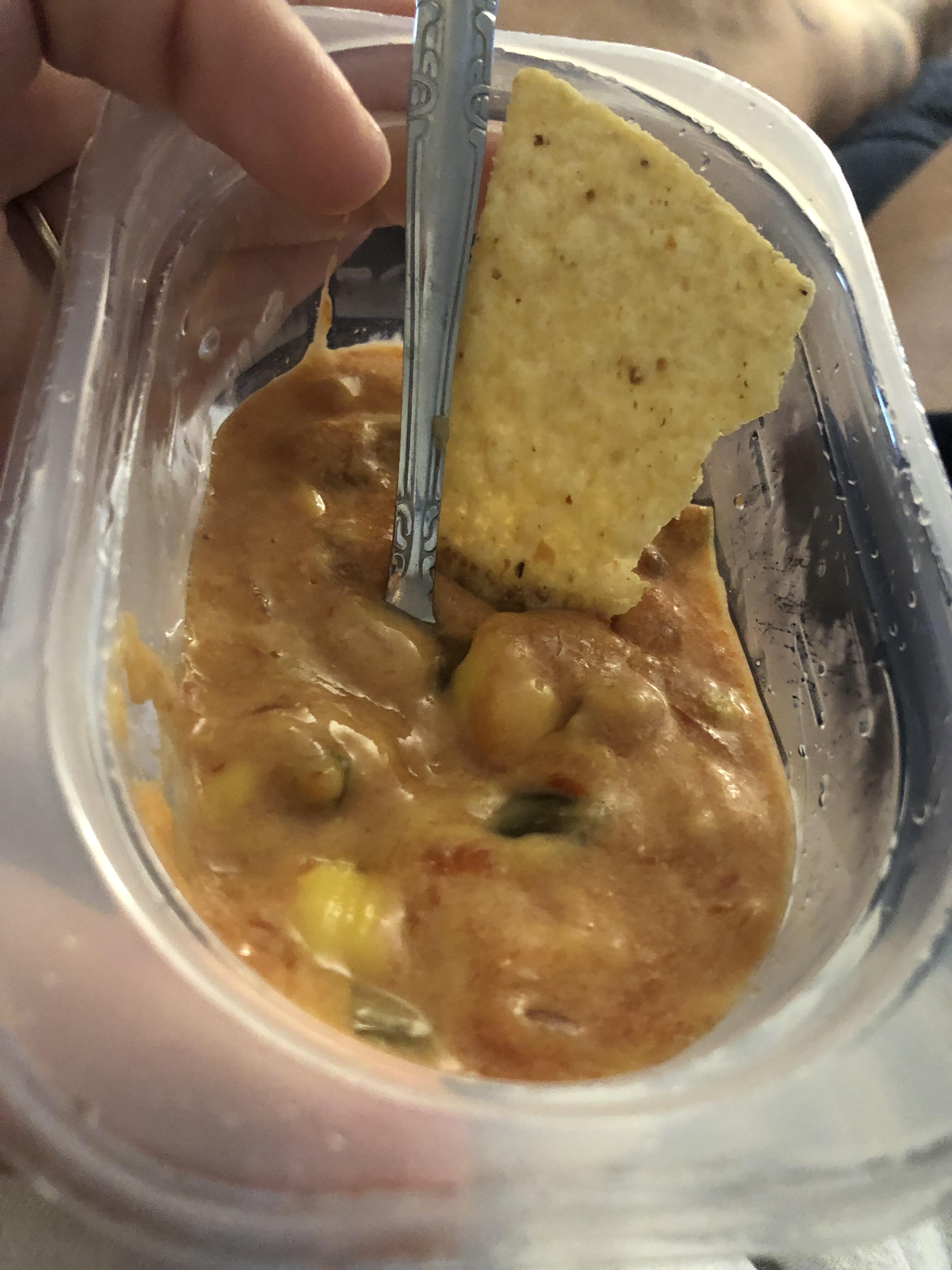 Off brand velveeta and cheap salsa. With stale tortilla chips. r
