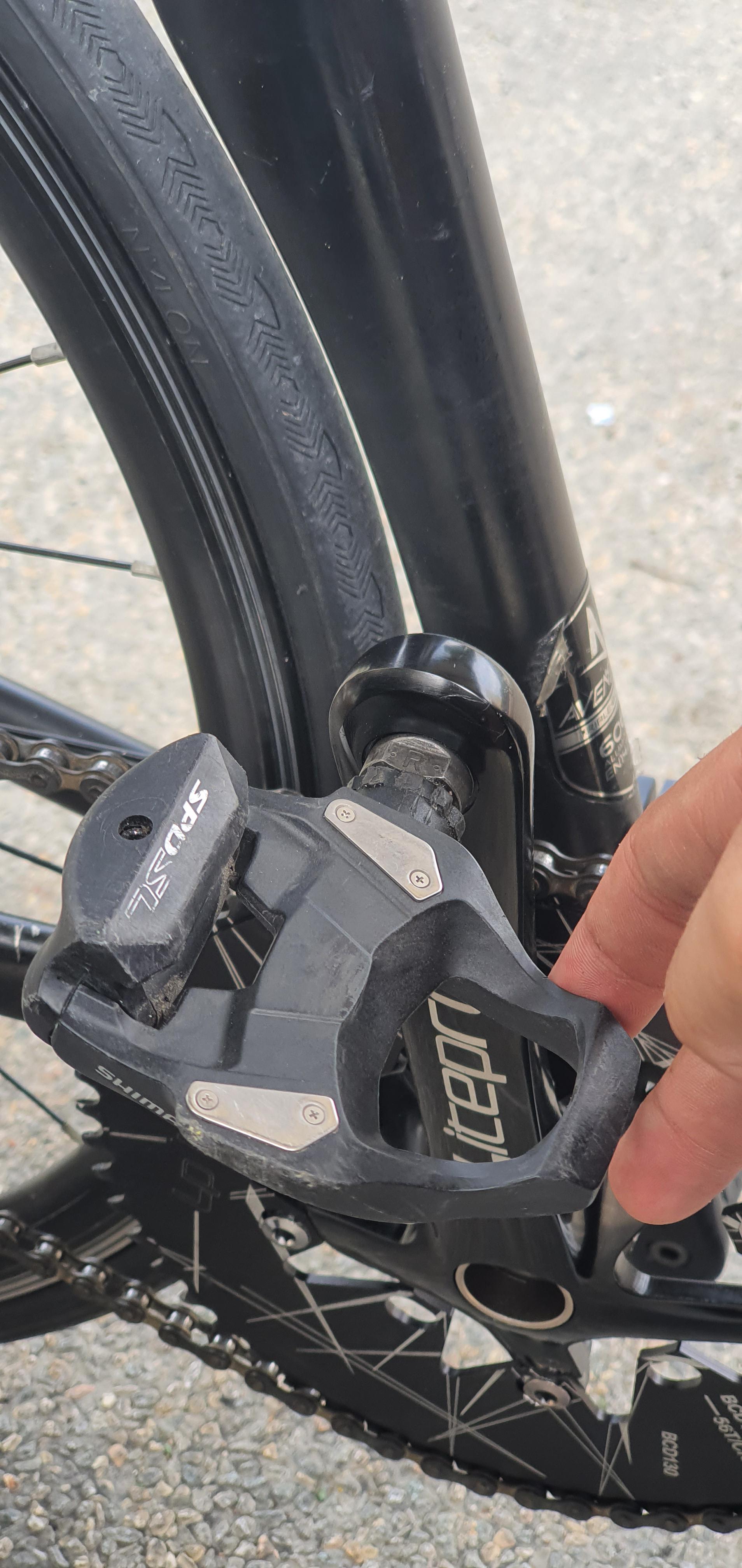 what does adjusting the clipless pedal tension do to clipping in and