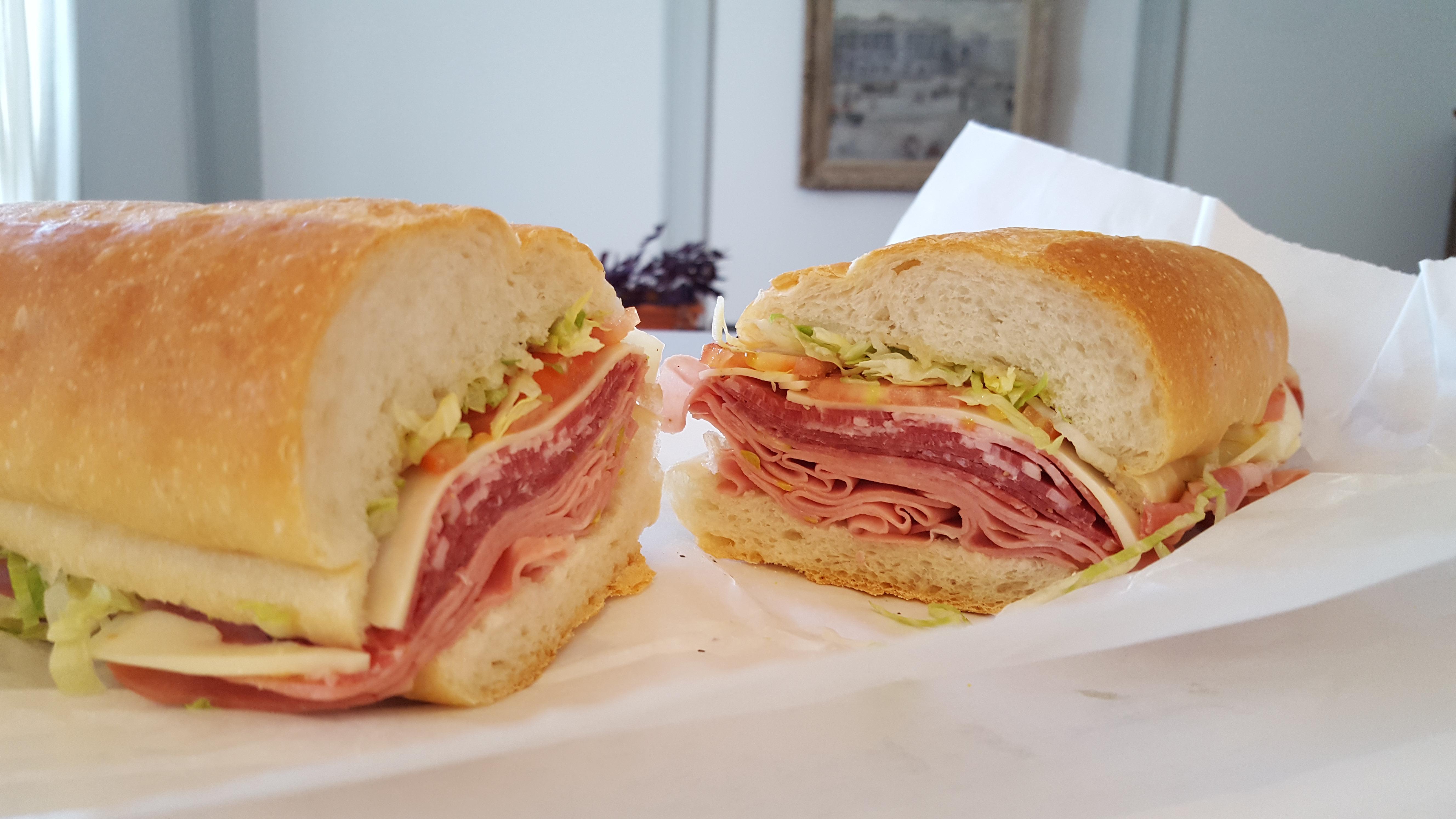 103, Salami, provolone, mortadella, sweet capicola, lettuce, tomato, oil and vinegar r