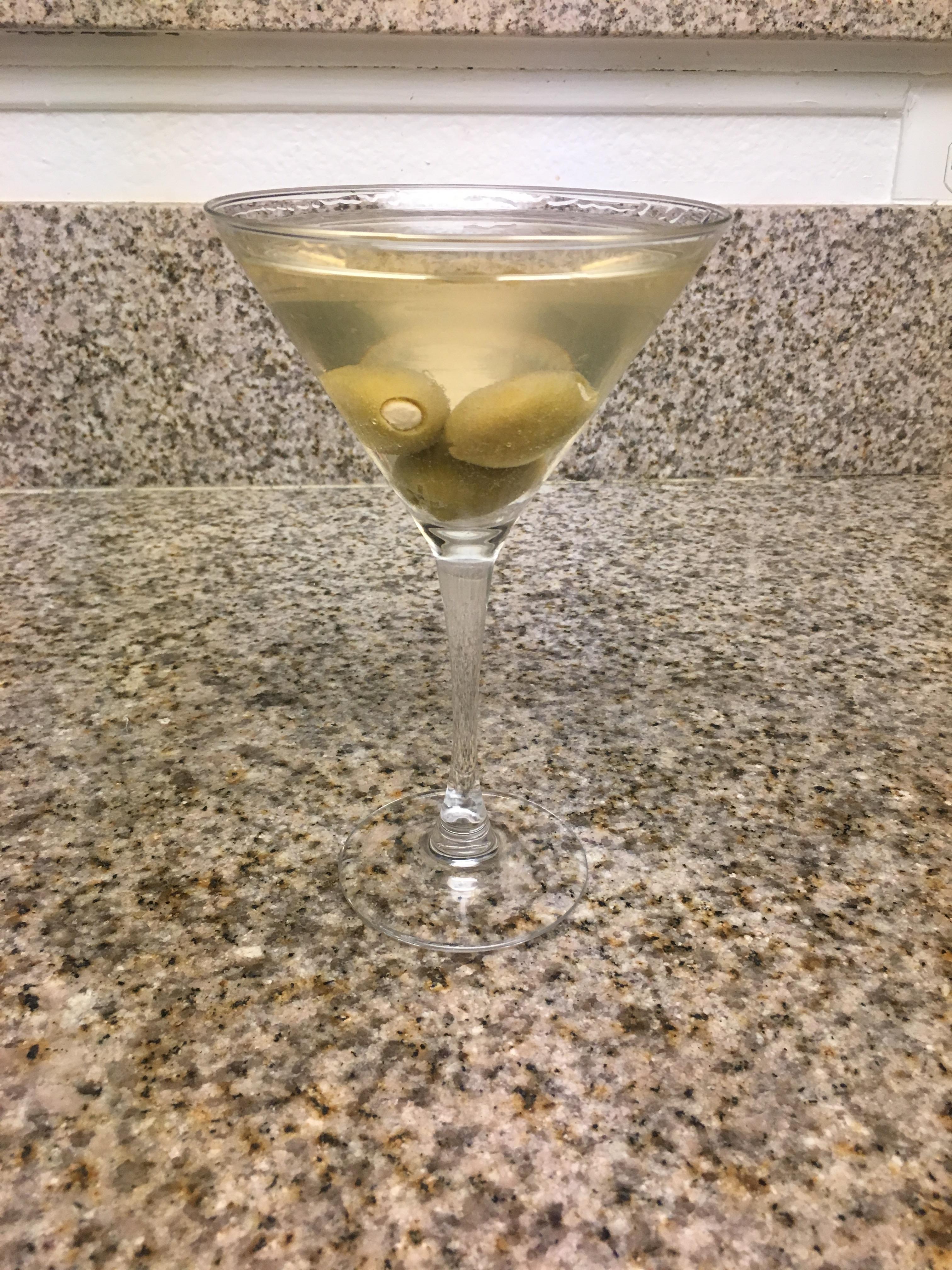 Perfect pour, dirty martini with bleu cheese stuffed olives. Once a