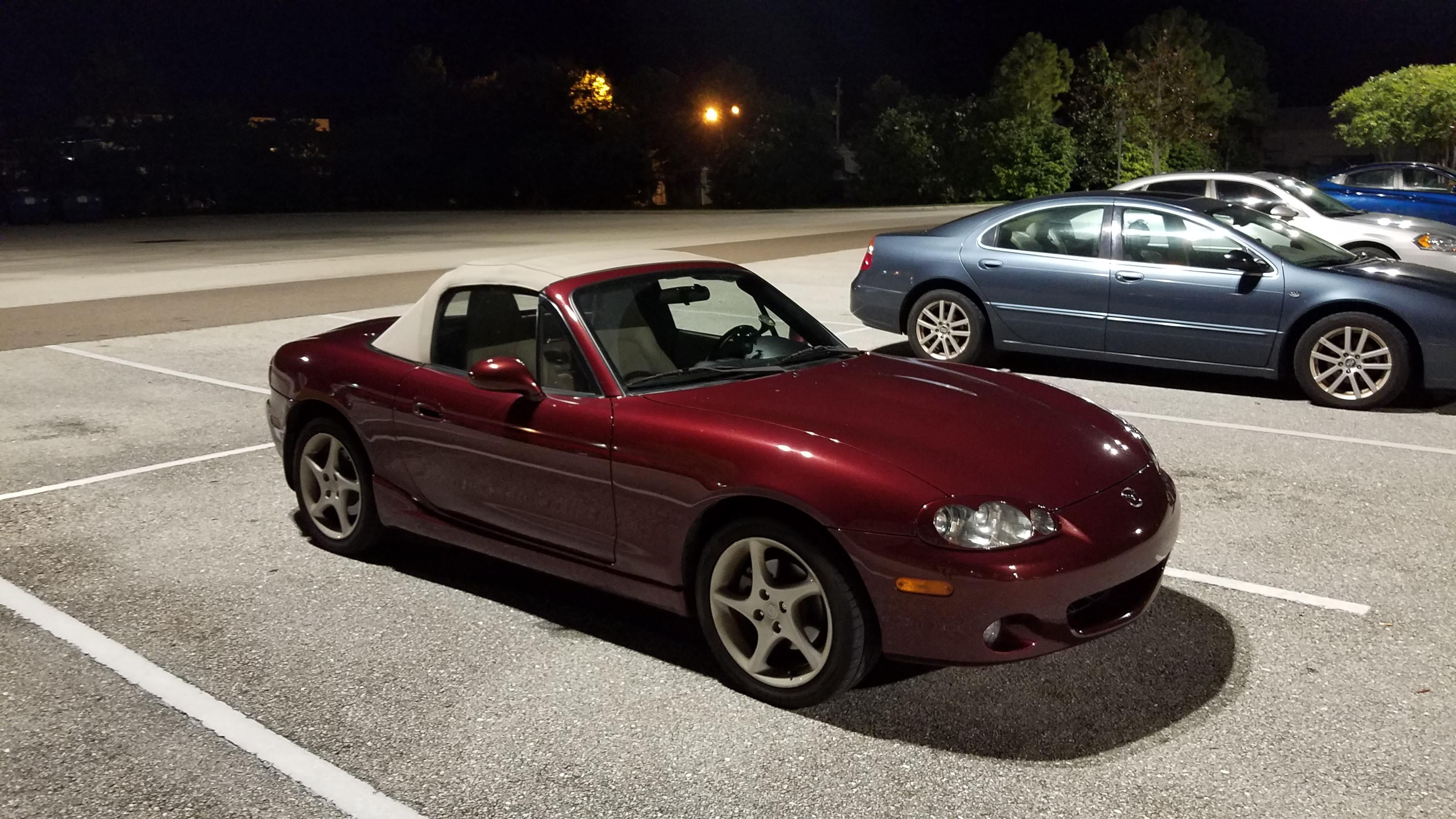 Under the parking lot lights! r/Miata