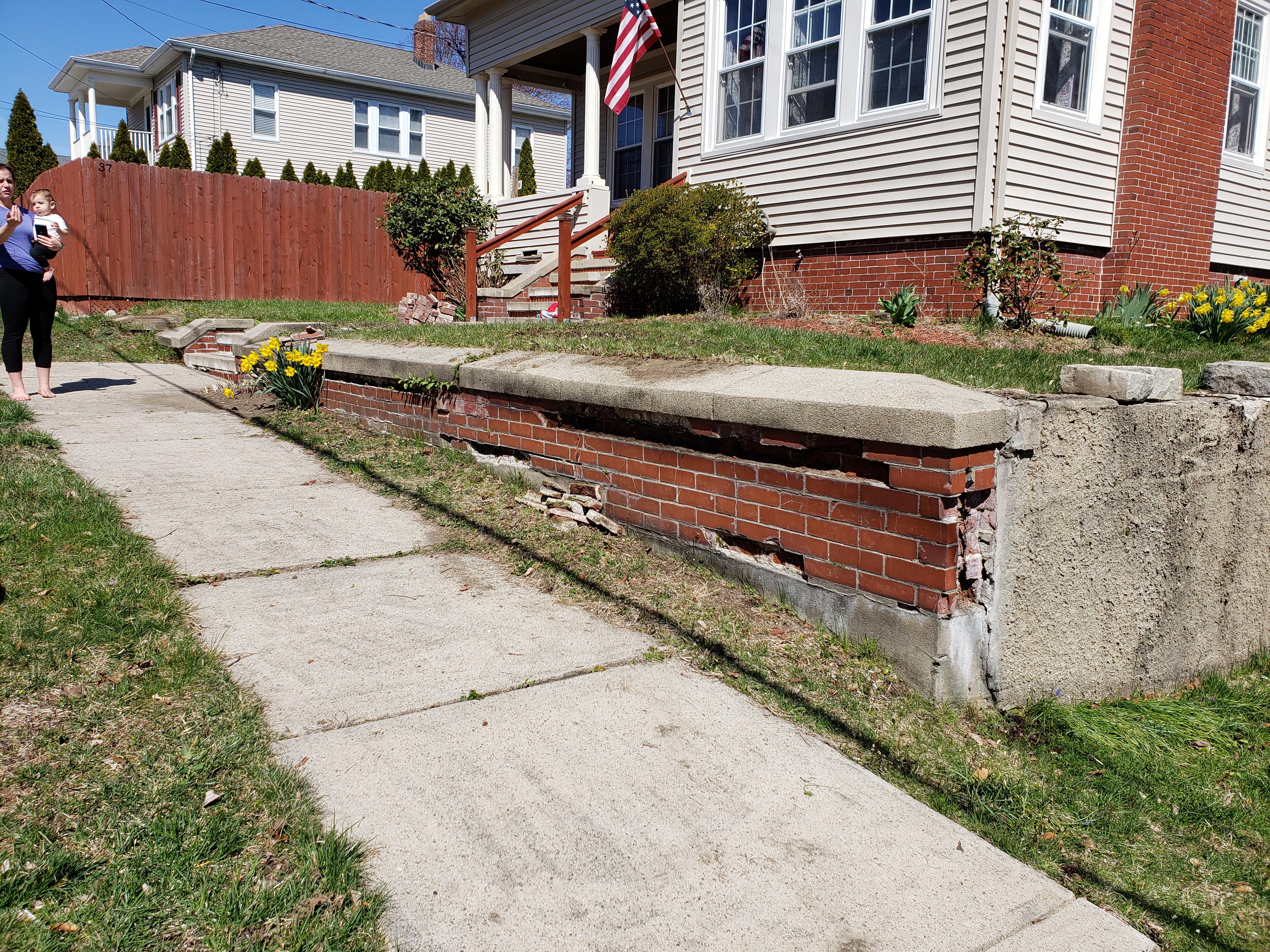 Crumbling brick retaining wall... Can't afford to completely demolish