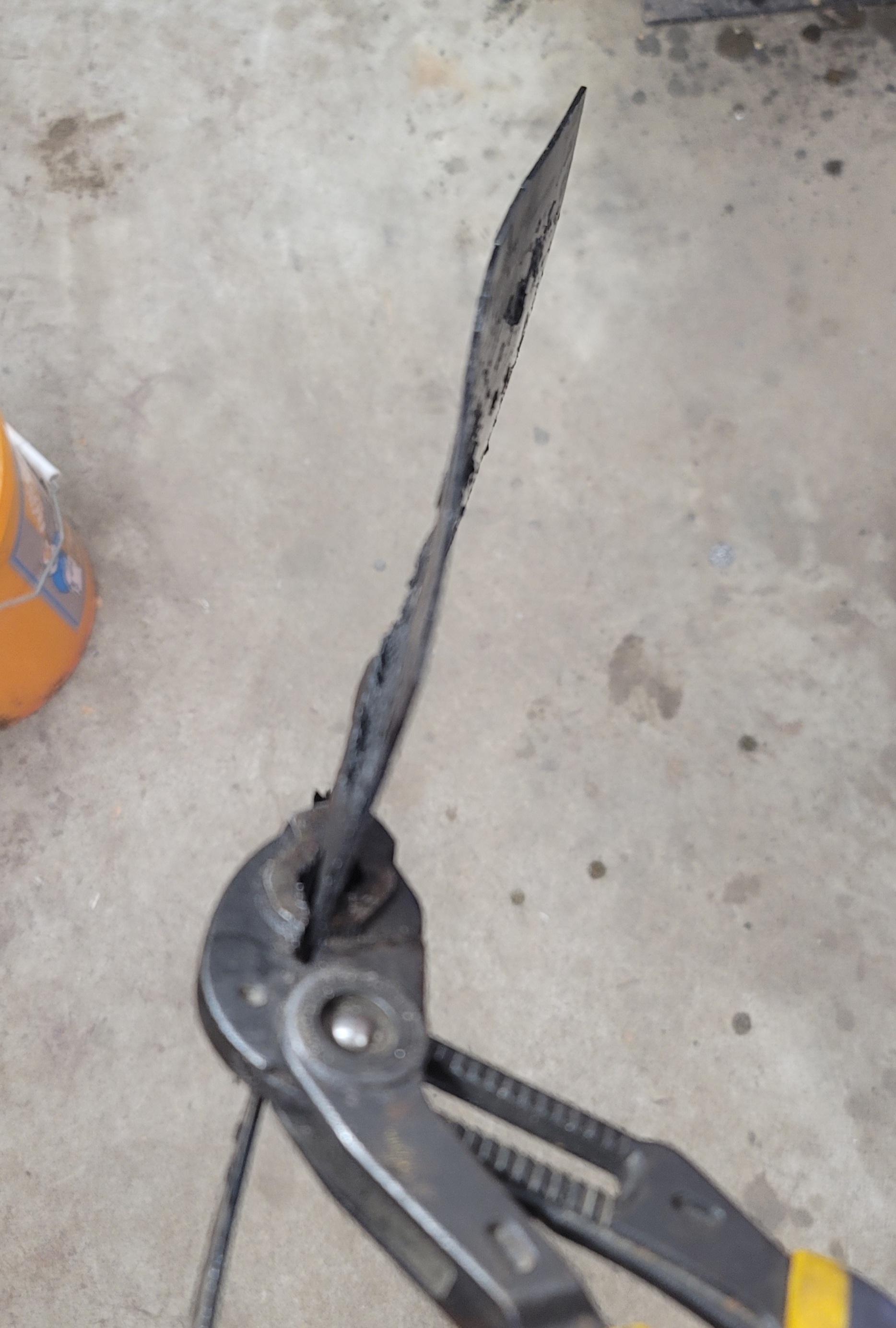 Massive quench warp trying for hamon r/knifemaking