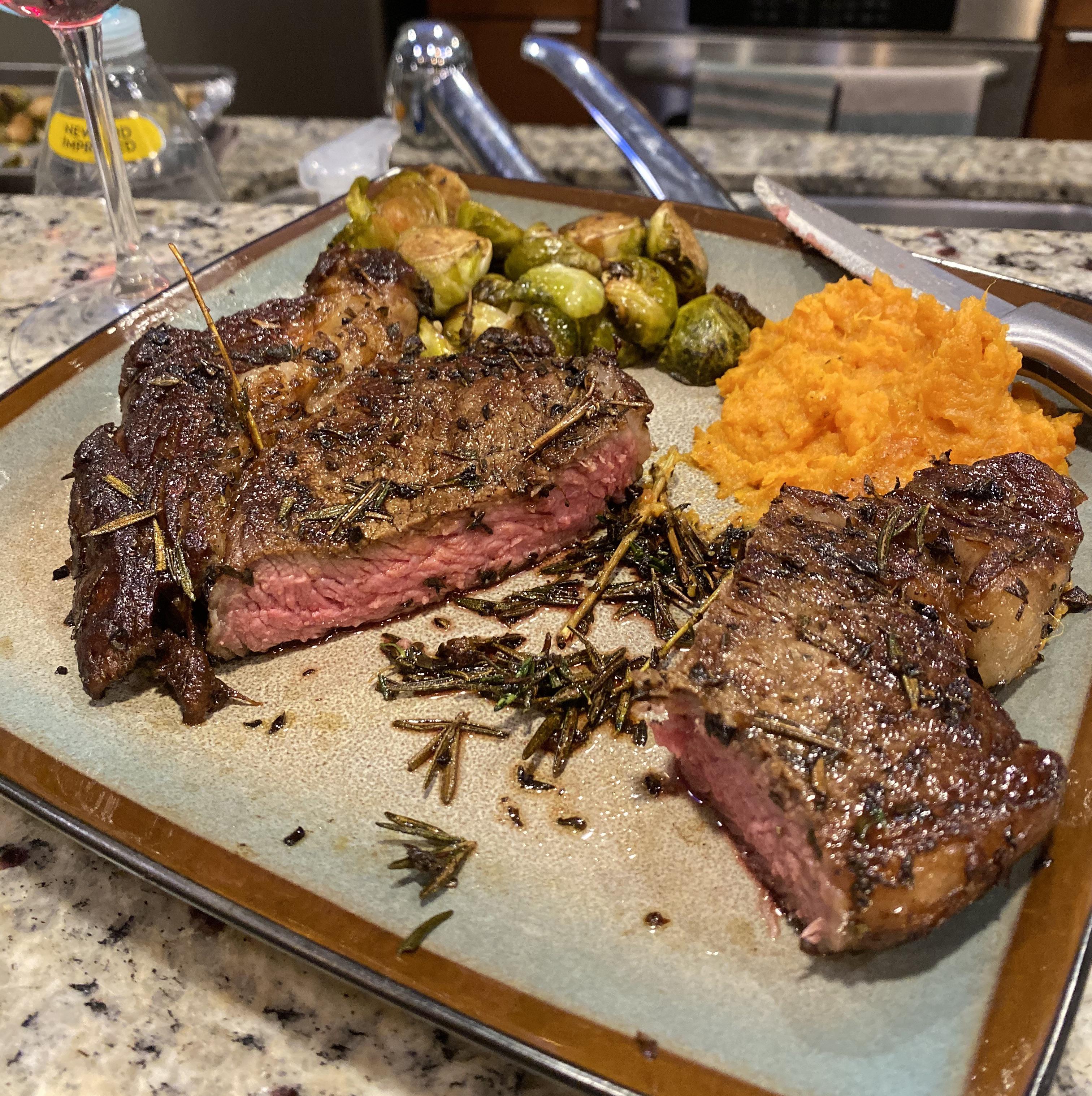 Made a dry aged ribeye in the Sous Vide, cooked with garlic, thyme, and
