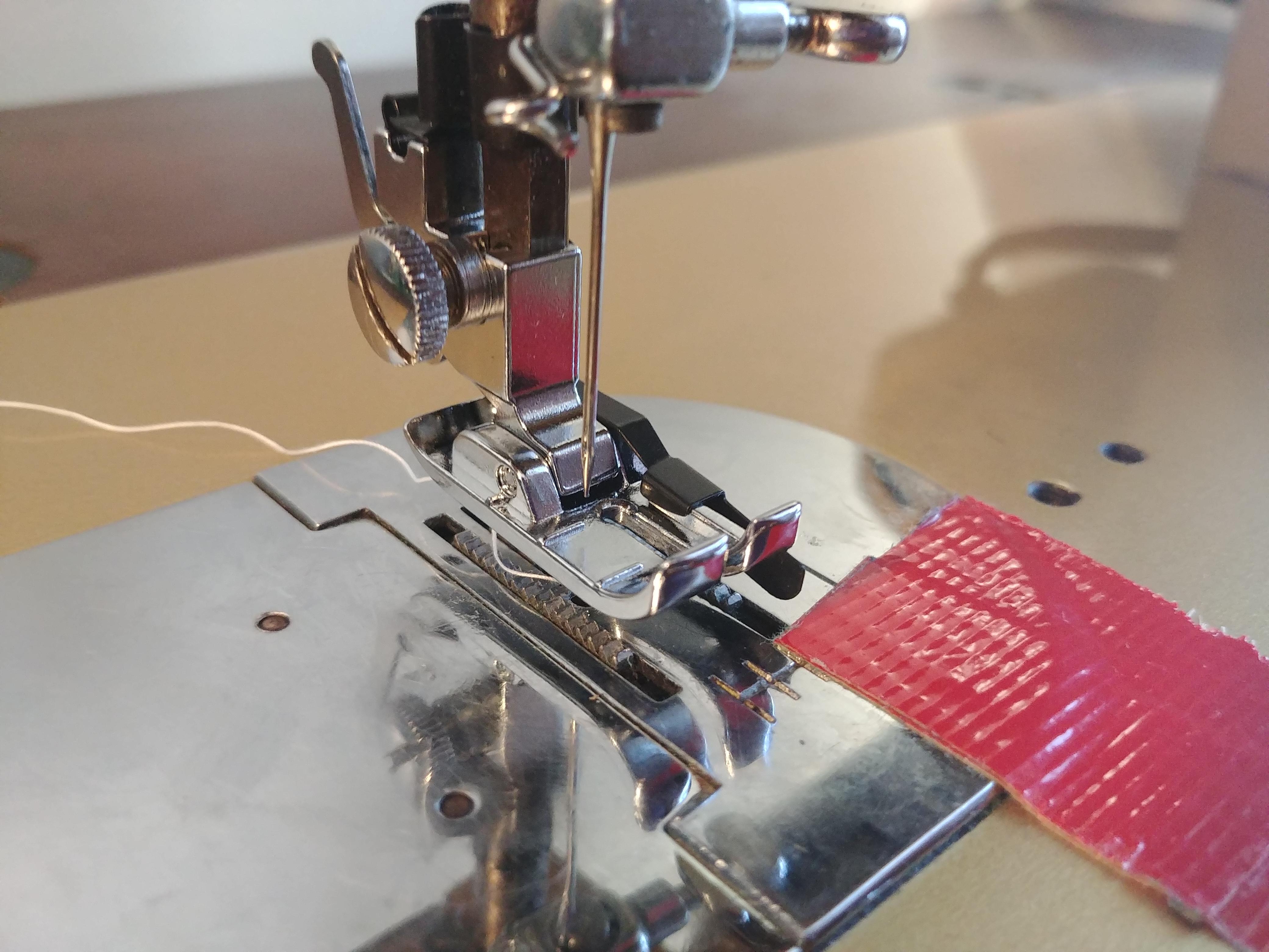 Help with my new 1/4" presser foot! The needle doesnt line up with the