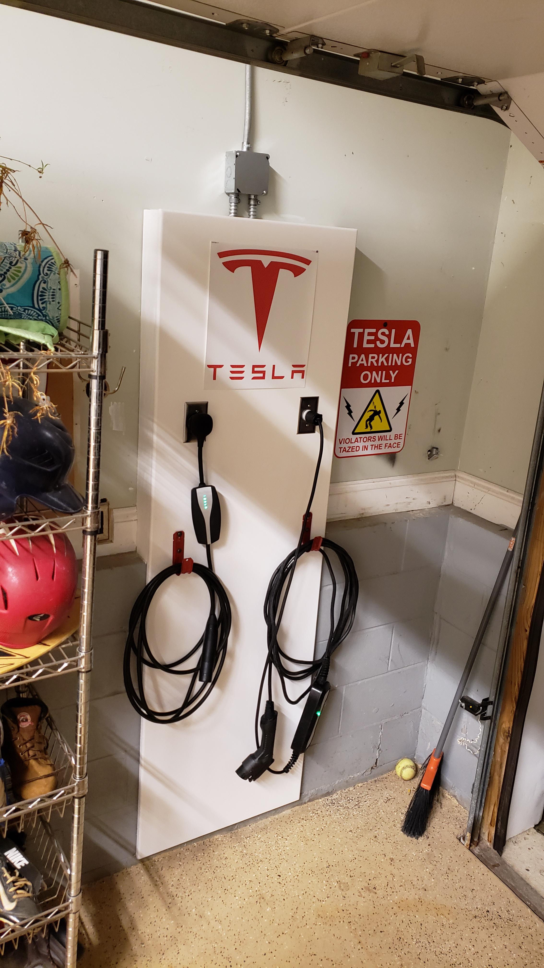The garage wall charging station I made for my new M3 and kids EV. 650