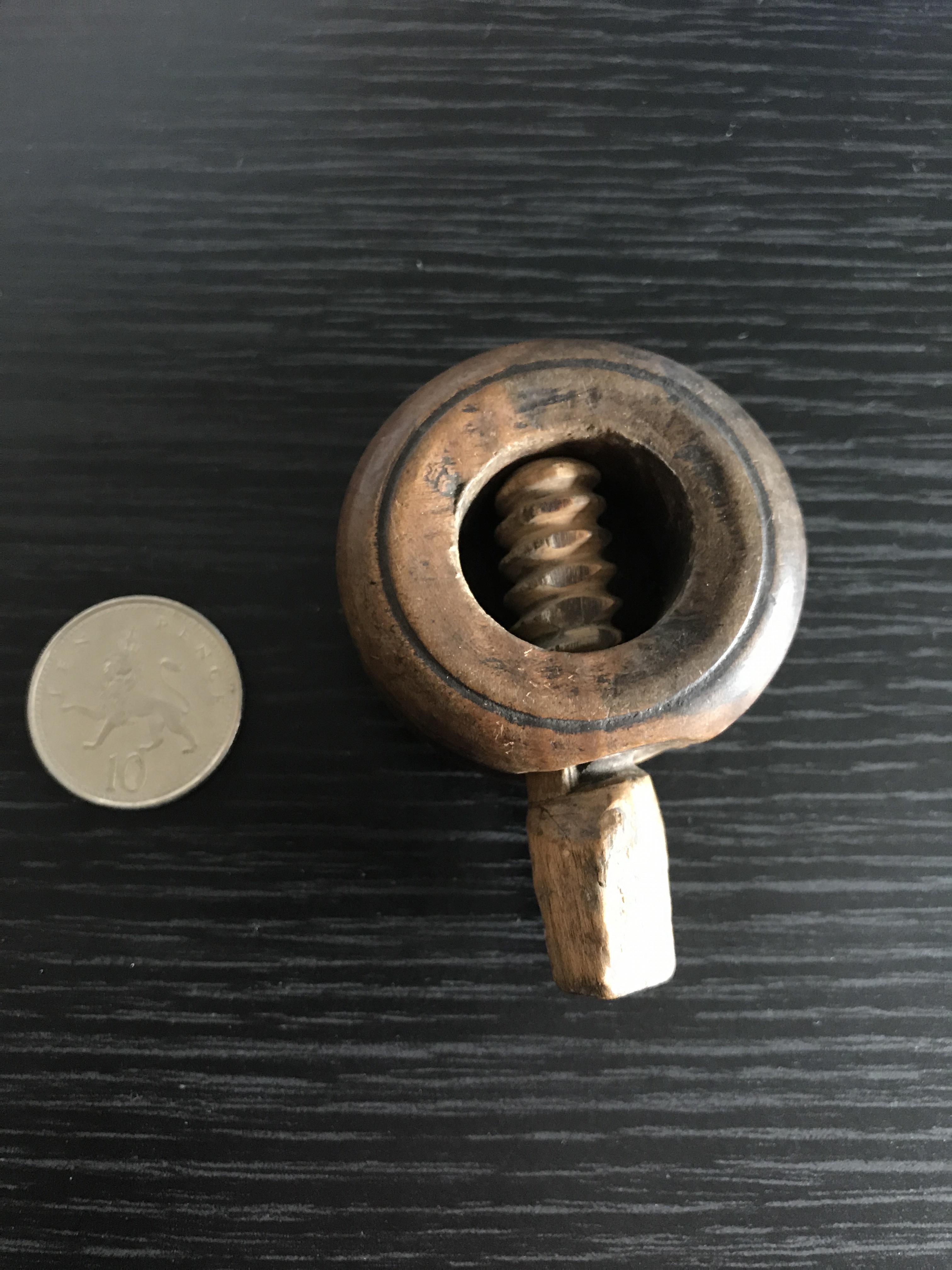 Possible nutmeg holder? Thumbscrew related torture device? No branding