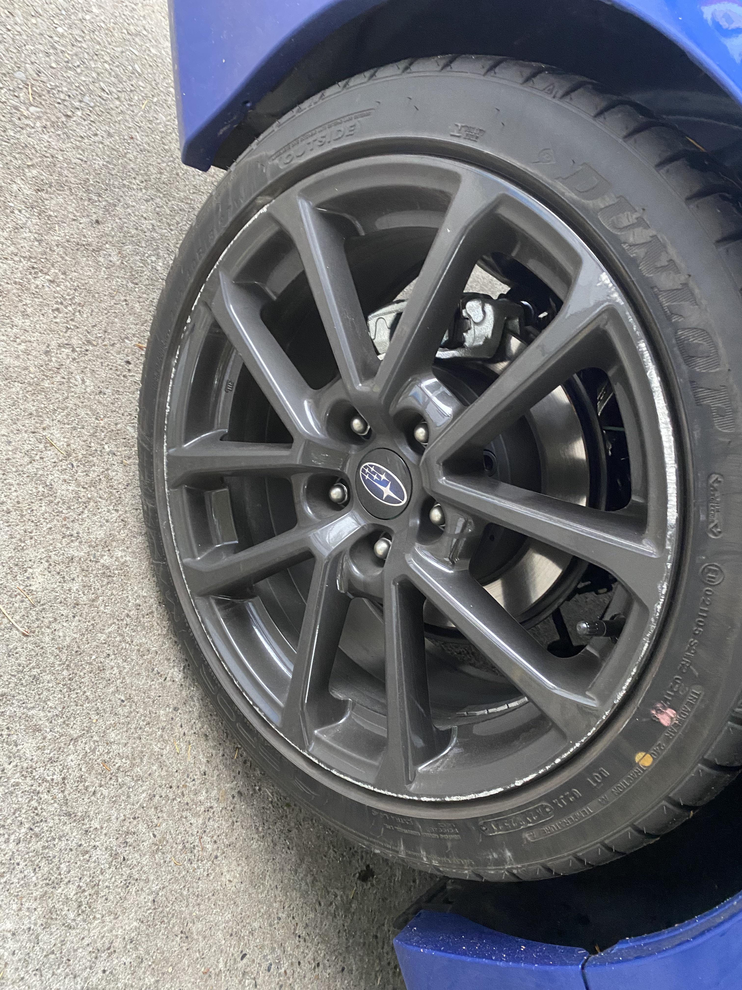 Hopping on today’s scuffed wheel trend, did this to my brand new WRX