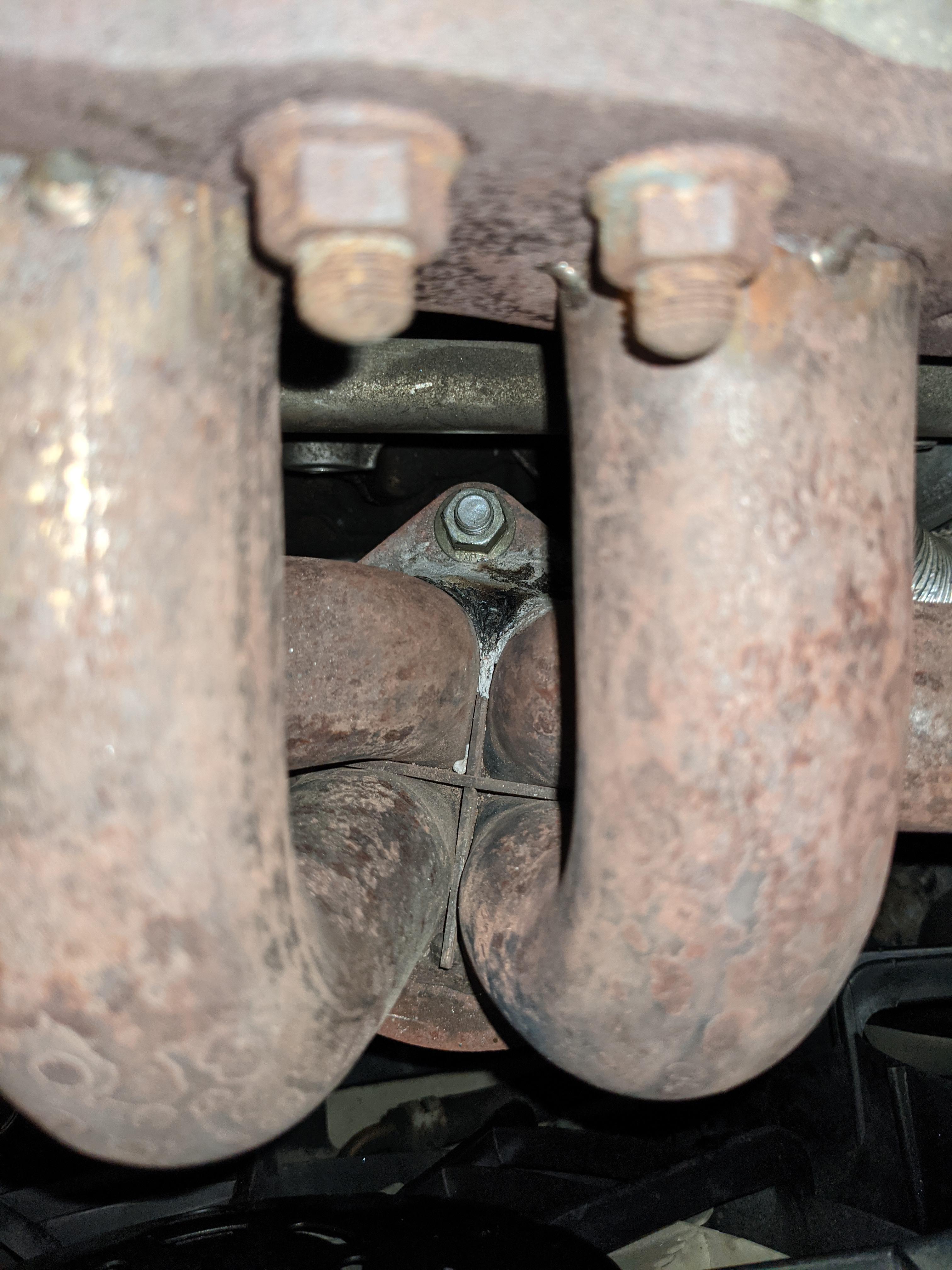 Attempted patch on exhaust manifold, is it a lost cause? r/AskMechanics