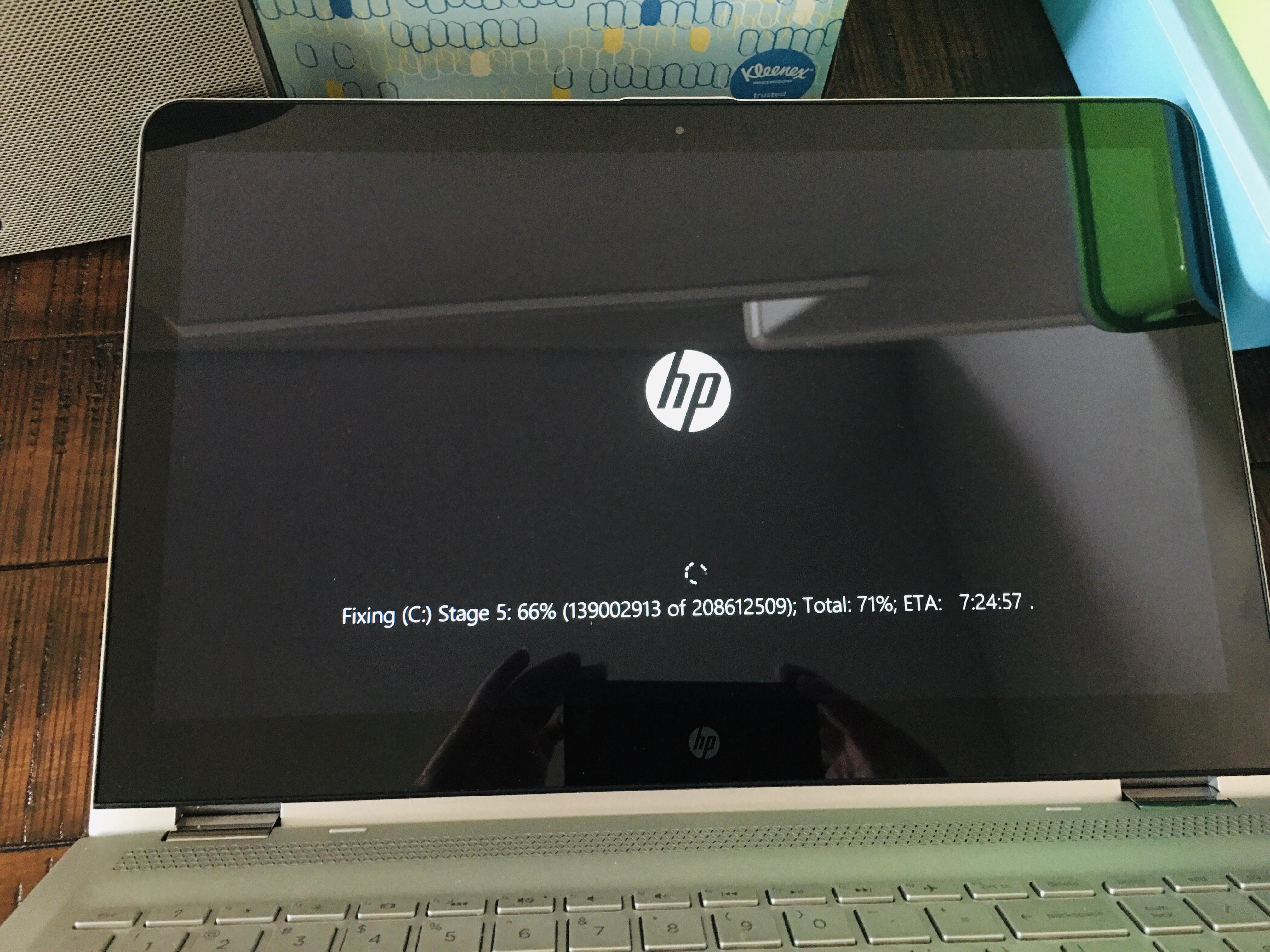 Laptop stuck. Restarted and keeps getting stuck at this stage. Advice