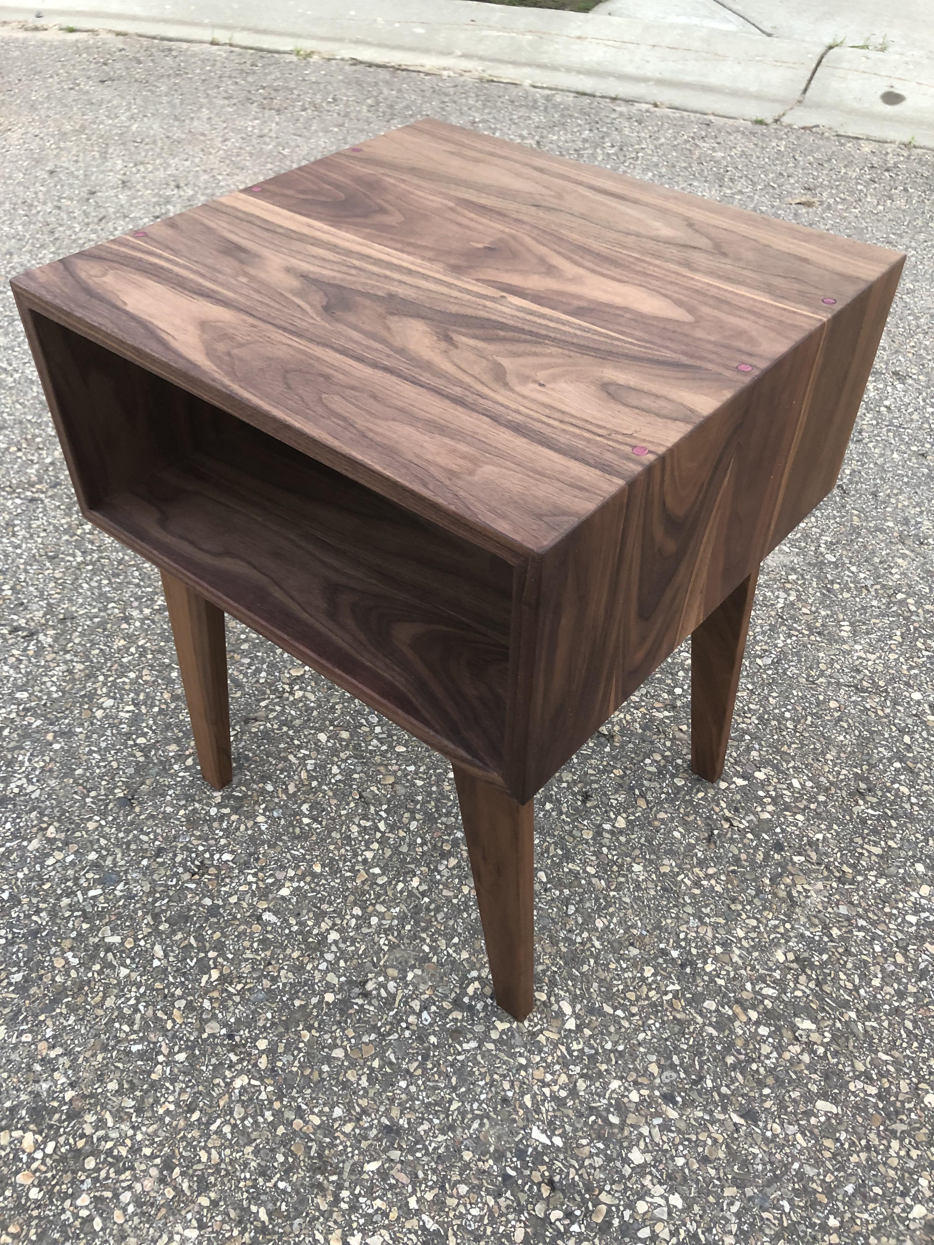 Mid century modern side table I made. Continuous grain walnut box with