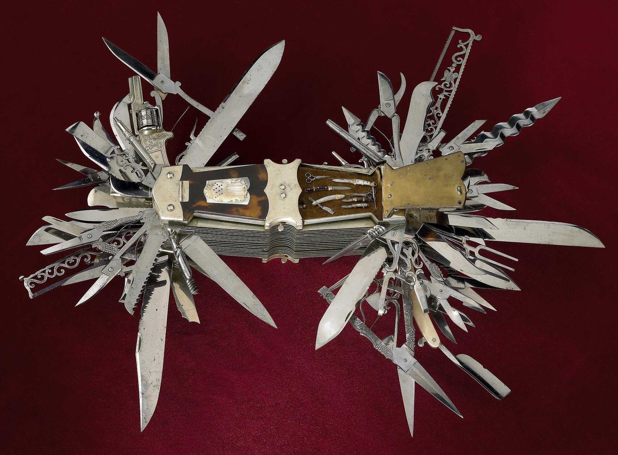 100bladed folding pocket knife from Germany, 1880, that also includes a pistol and a cigar
