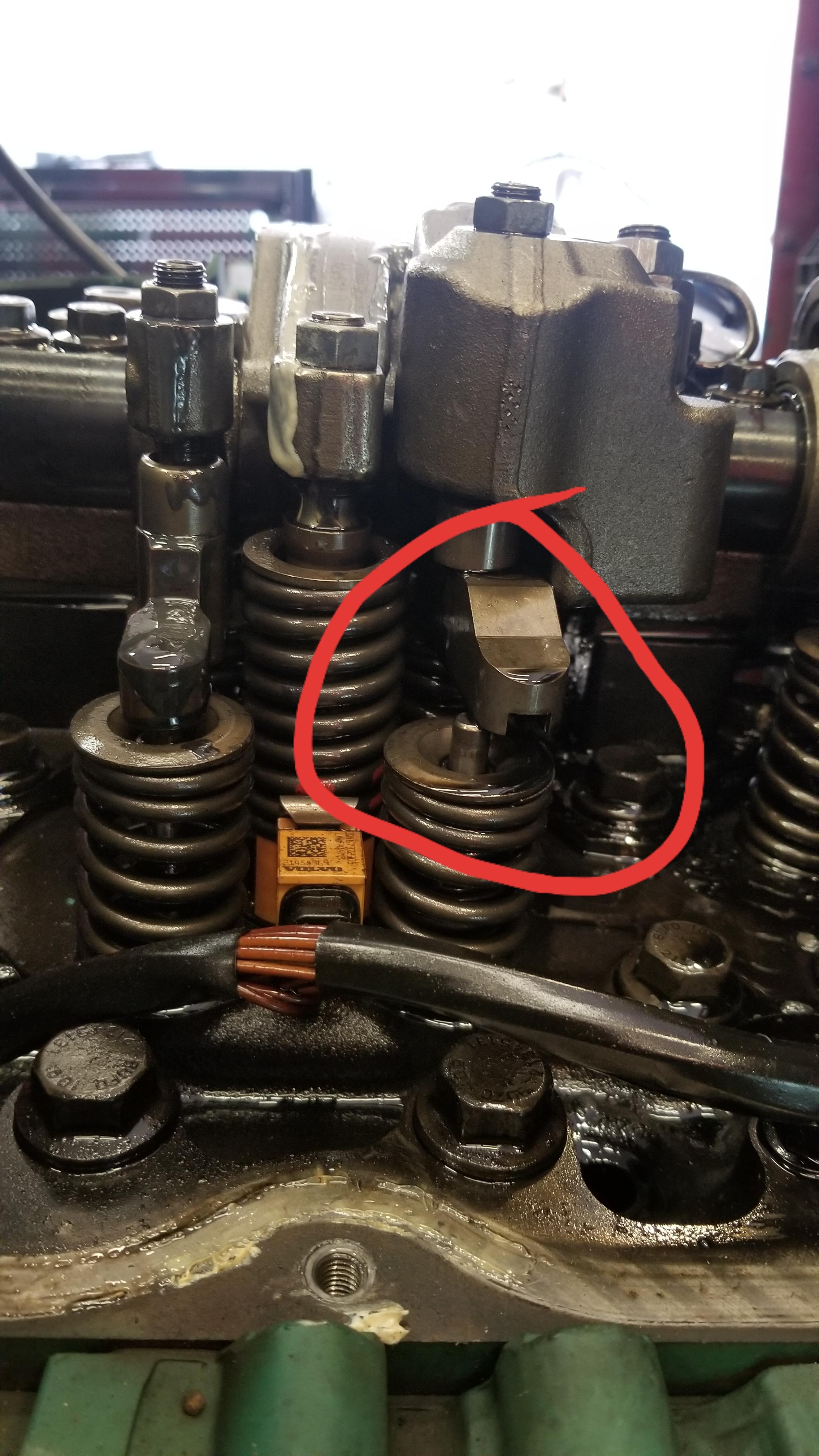 More carnage from previous tech installing cam in Volvo D13. Exhaust