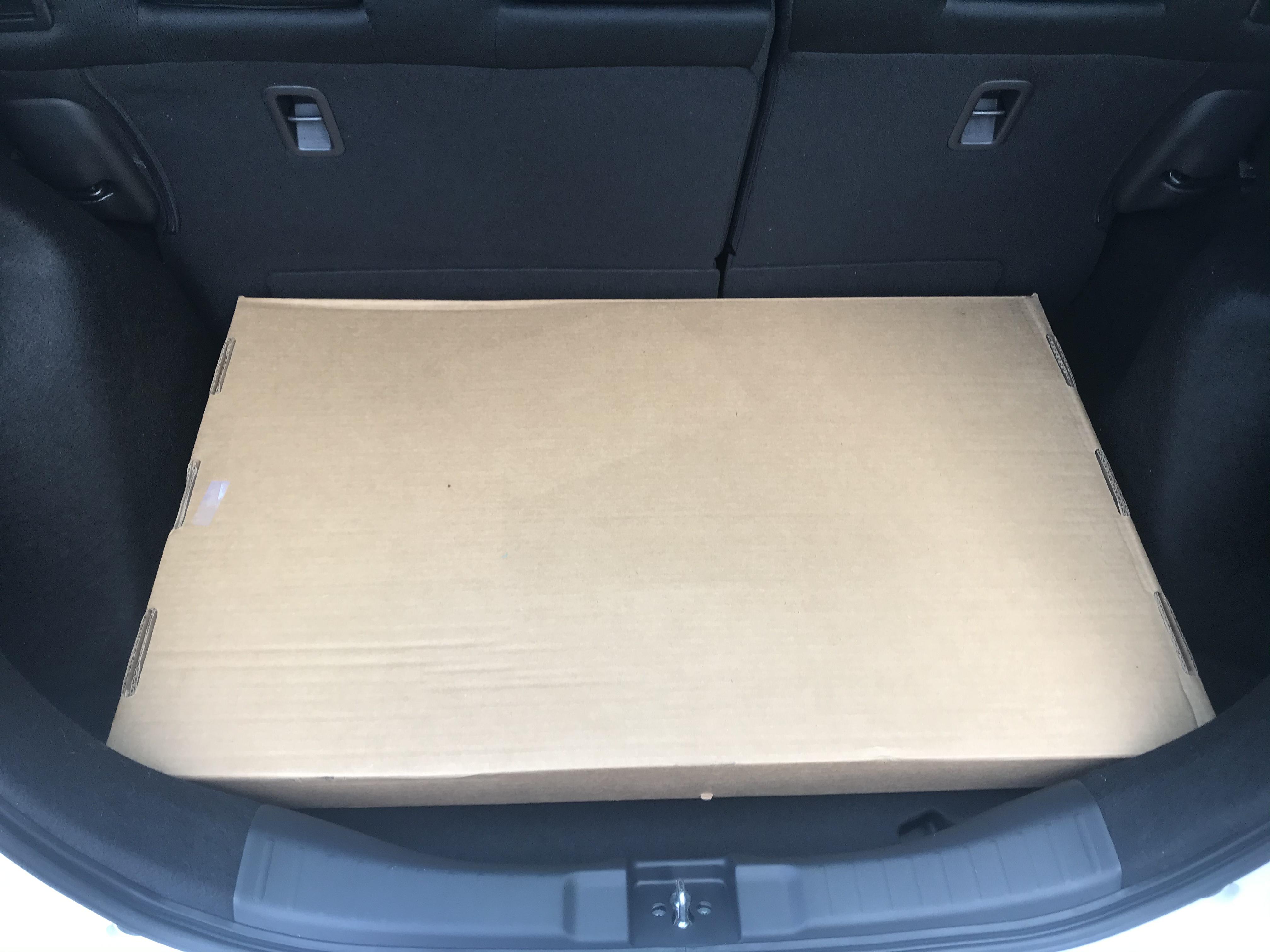 The way the floormat box fits in the hatch of a Honda Fit. r/Perfectfit