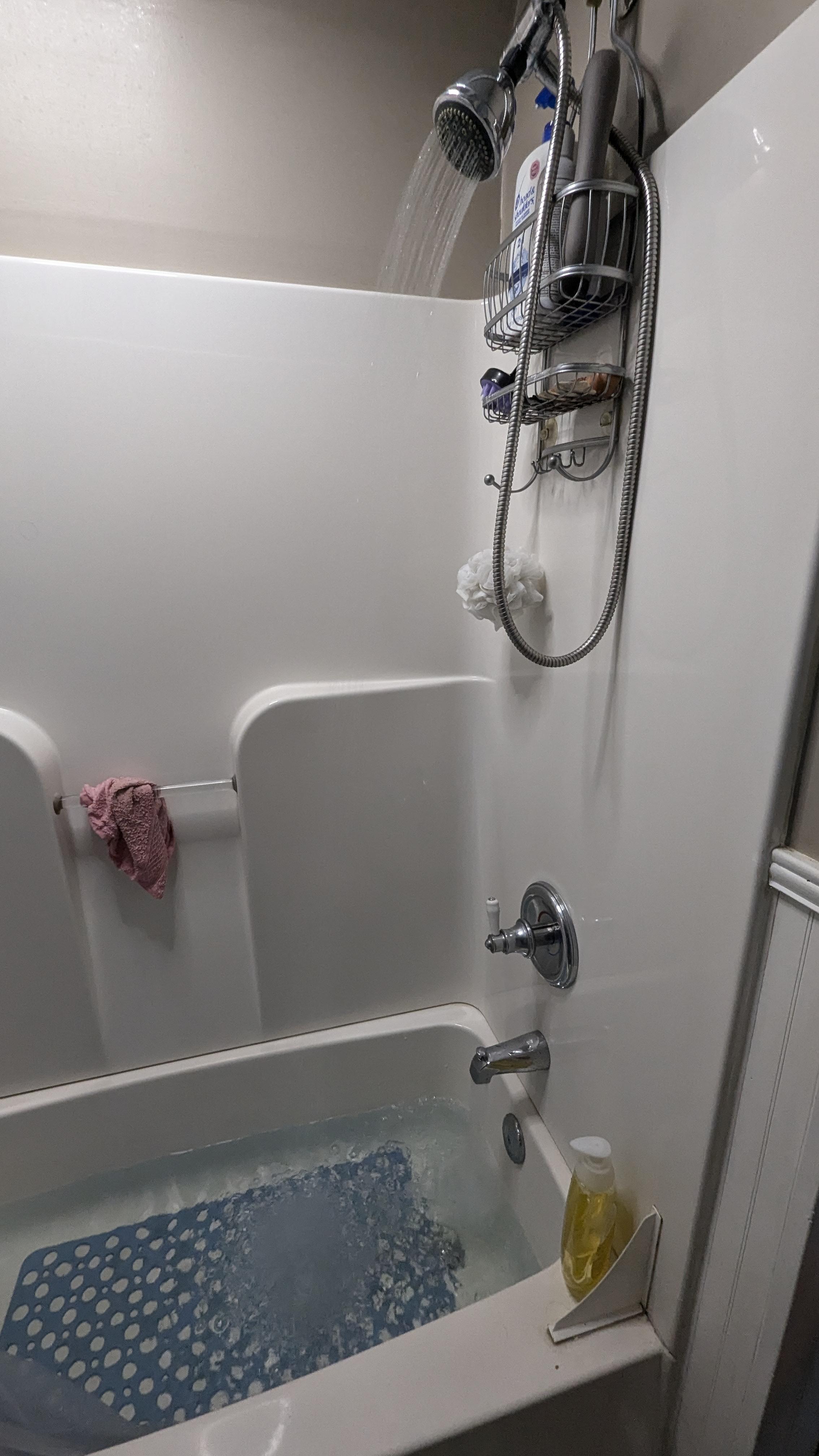 Water comes out of showerhead when running bath r/DIY