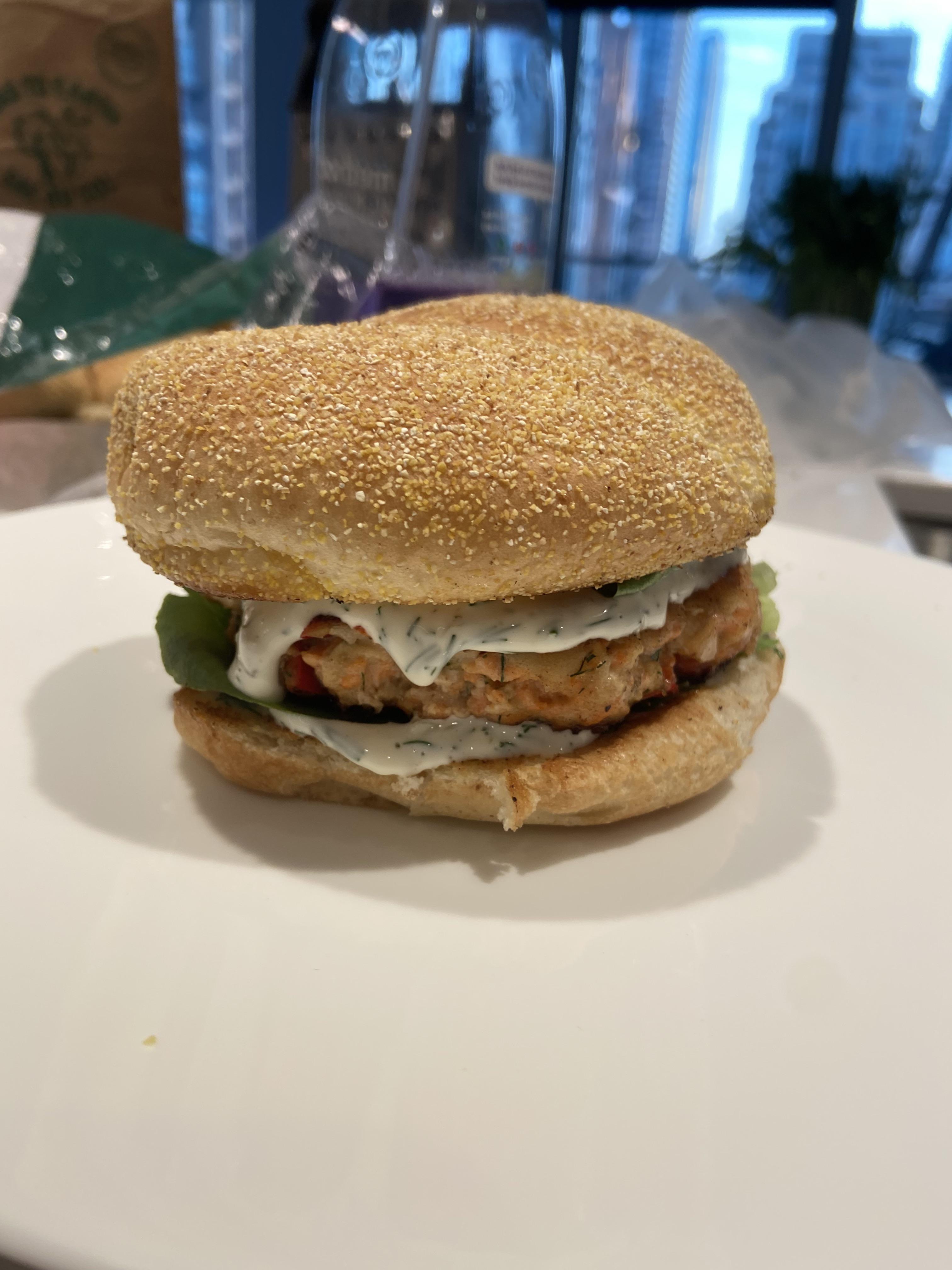 [oc] Salmon burger with dill yogurt sauce r/FoodPorn