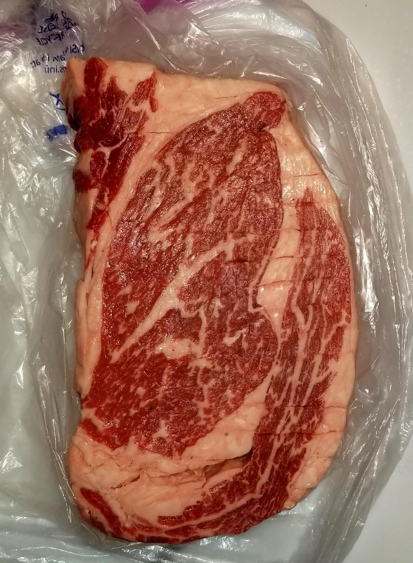 Nice choice ribeye from Costco. Effectively prime. r/steak
