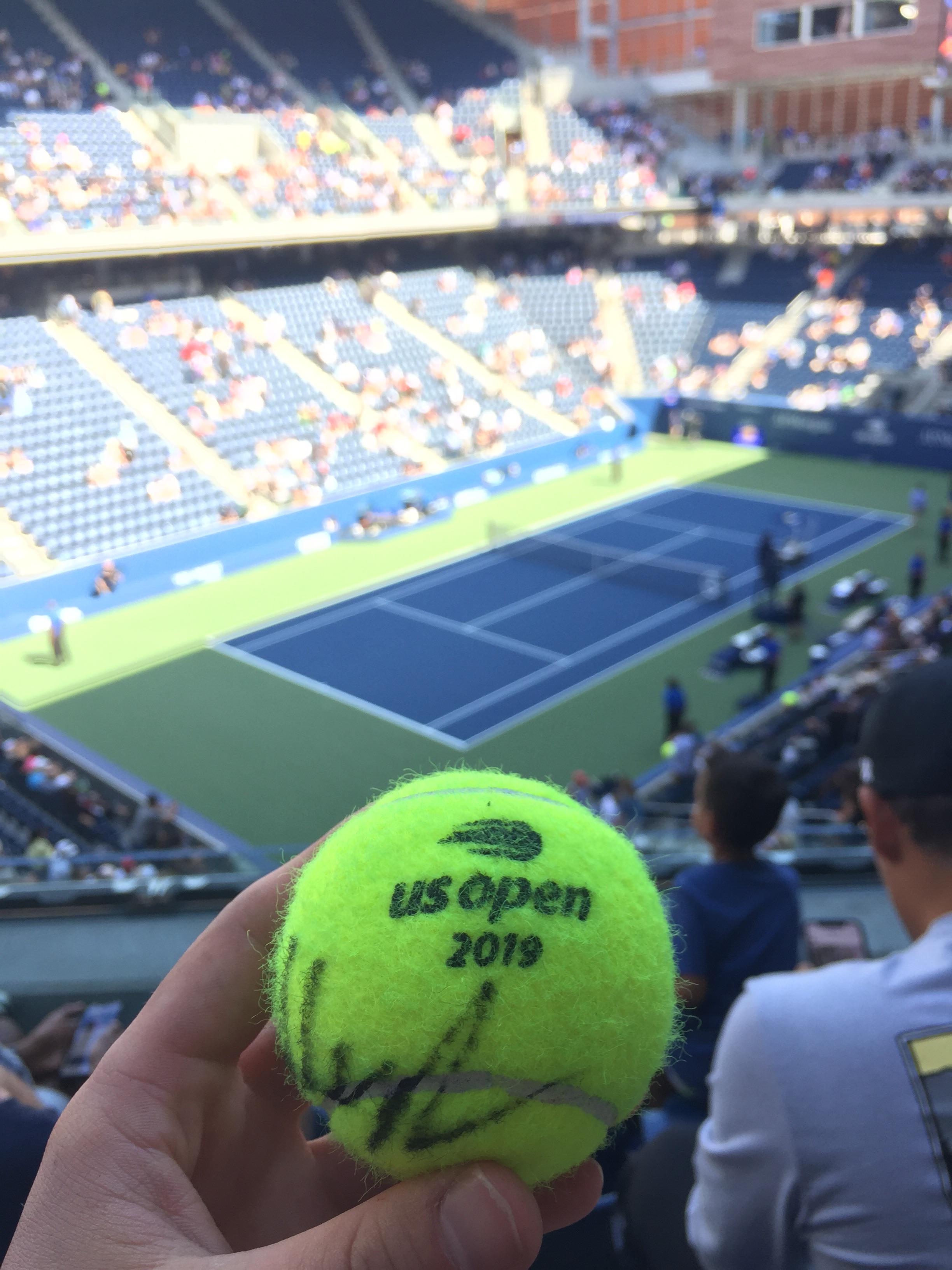 I see both of your tennis balls, and I raise you this Daniil Medvedev signed 2019 US Open tennis
