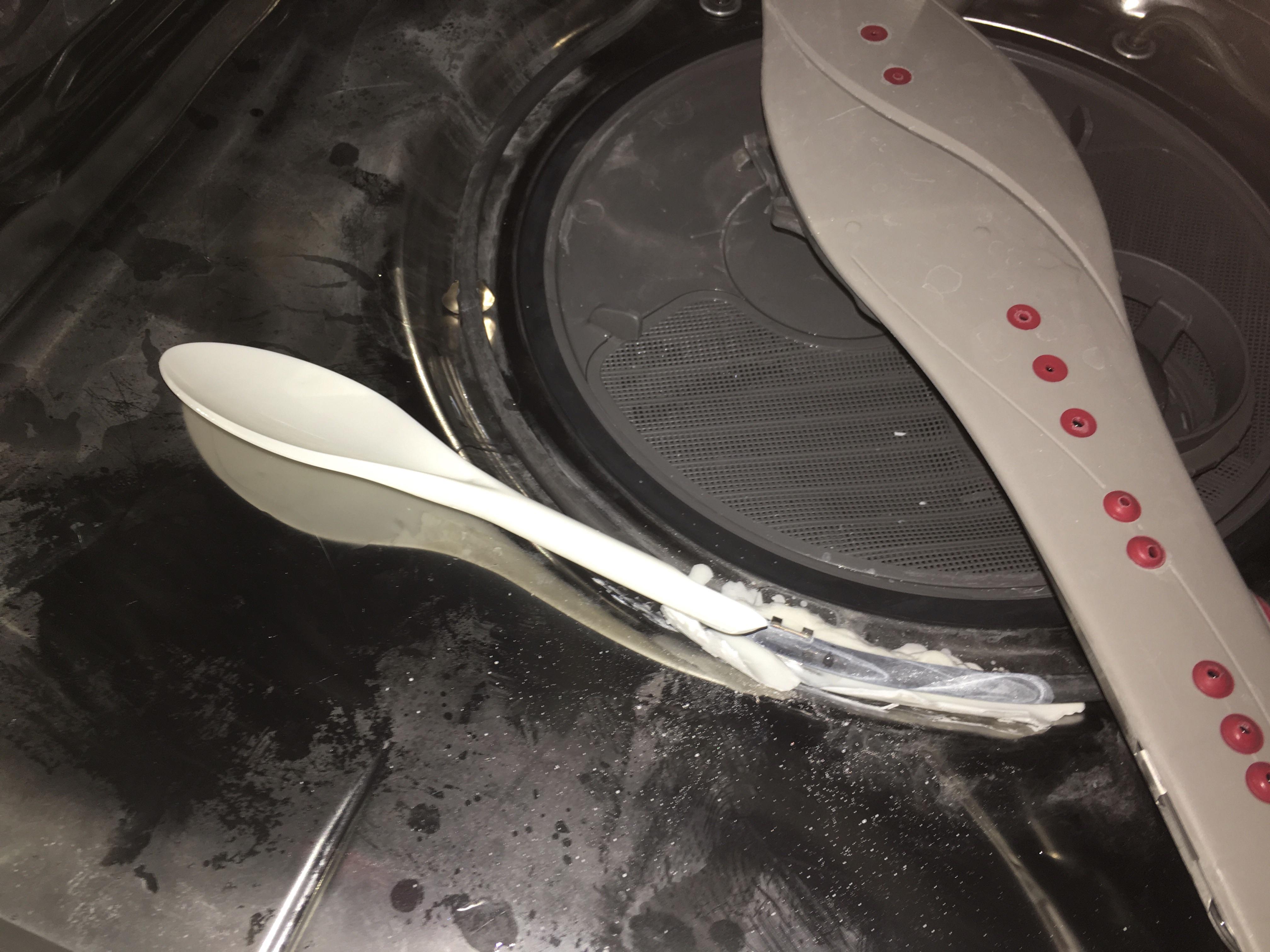 This mixing spoon got caught in the dishwasher, & melted. The whole