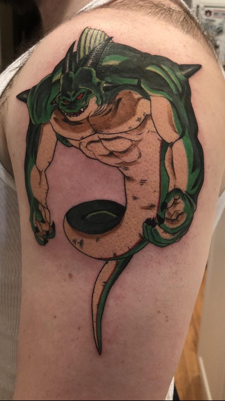 My first tattoo, Porunga from Dragon Ball, by William Quiceno at
